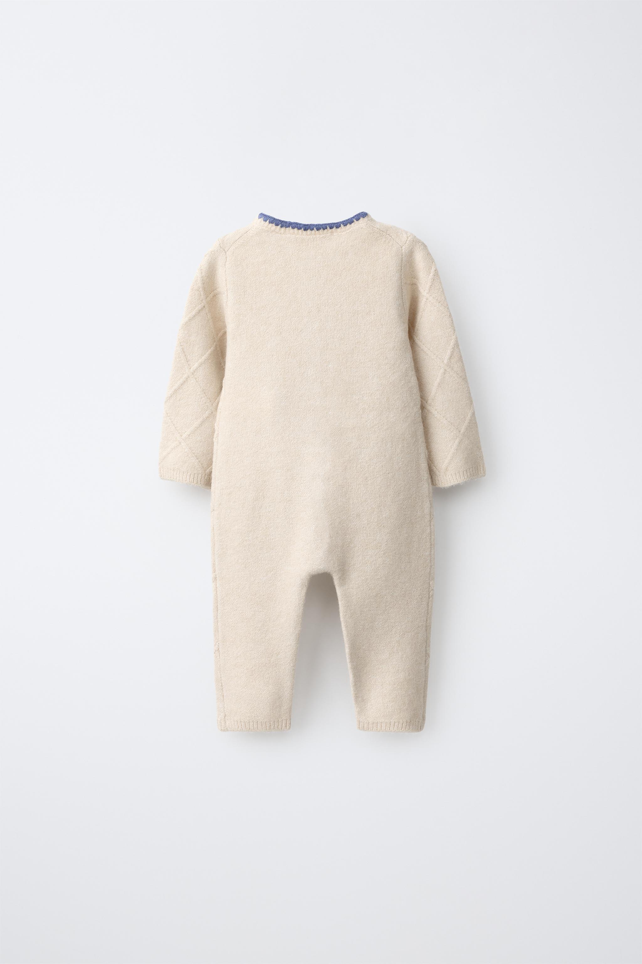 LONG KNIT JUMPSUIT WITH EMBROIDERED FLOWERS