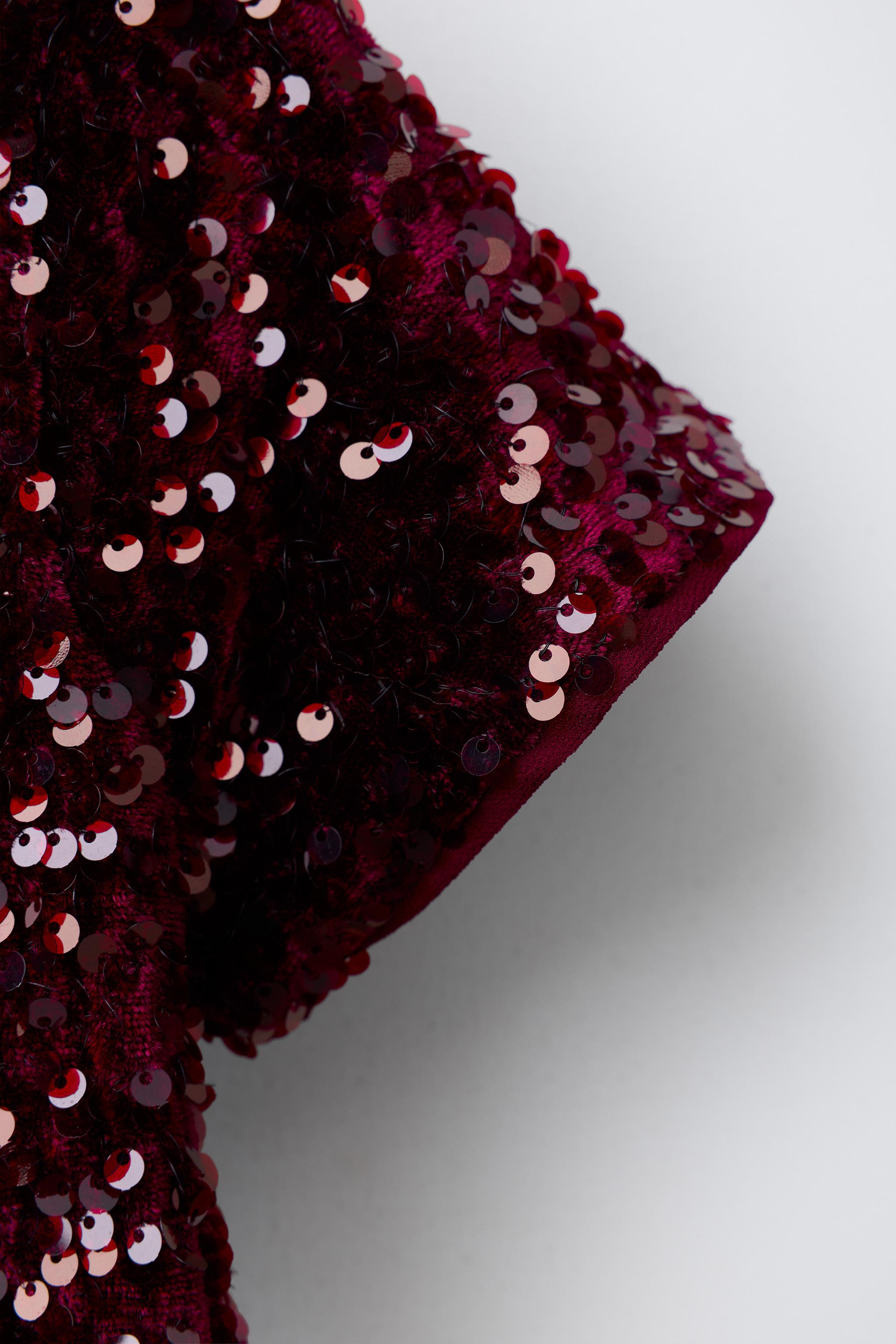 ROBE À PAILLETTES ET NŒUD EN VELOURS