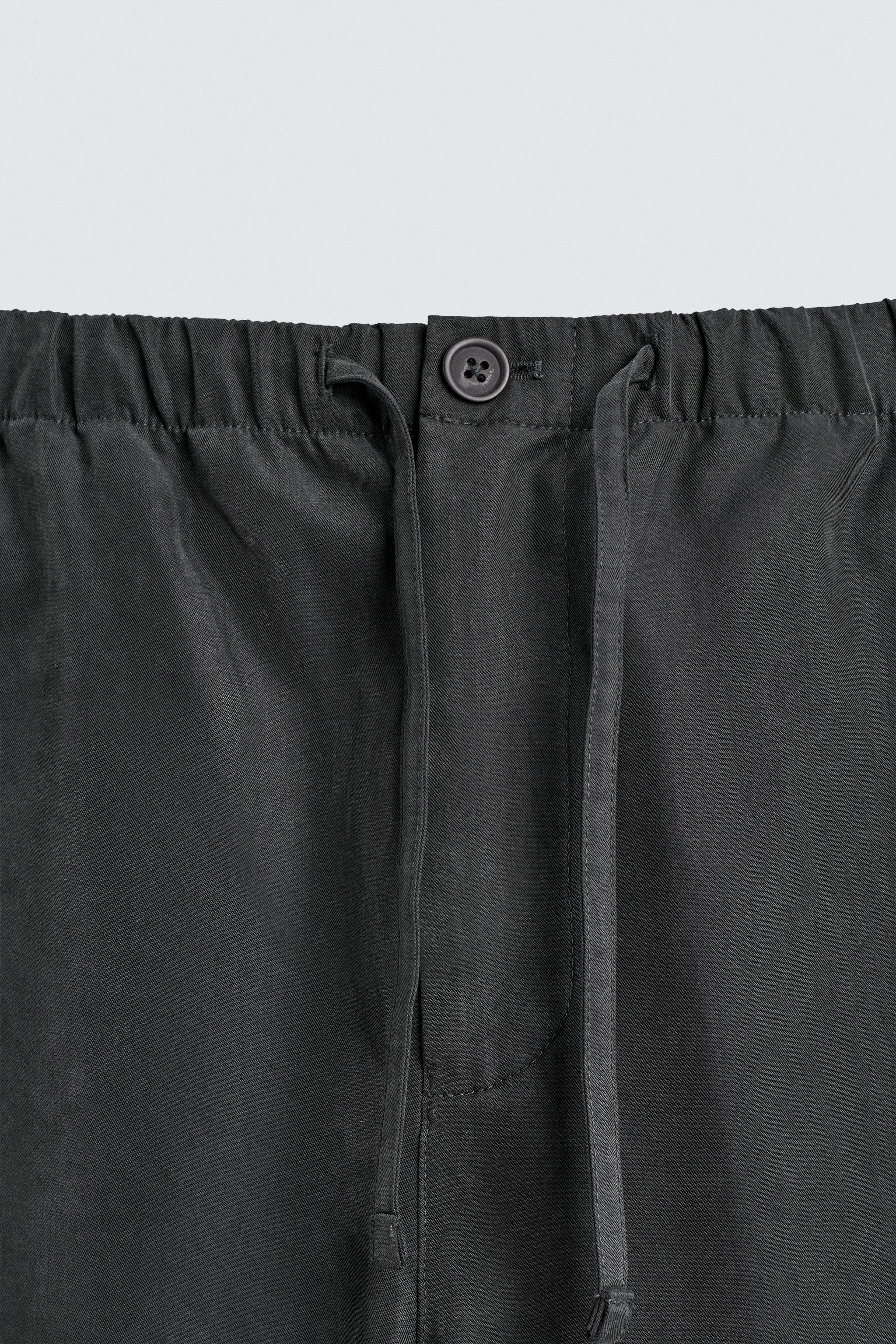 RELAXED FIT FLOWY PANTS