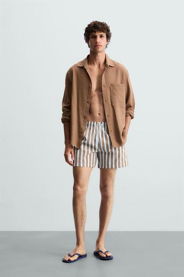 BAÑADOR MEDIO RAYAS - Celeste de Zara - Imagen 0