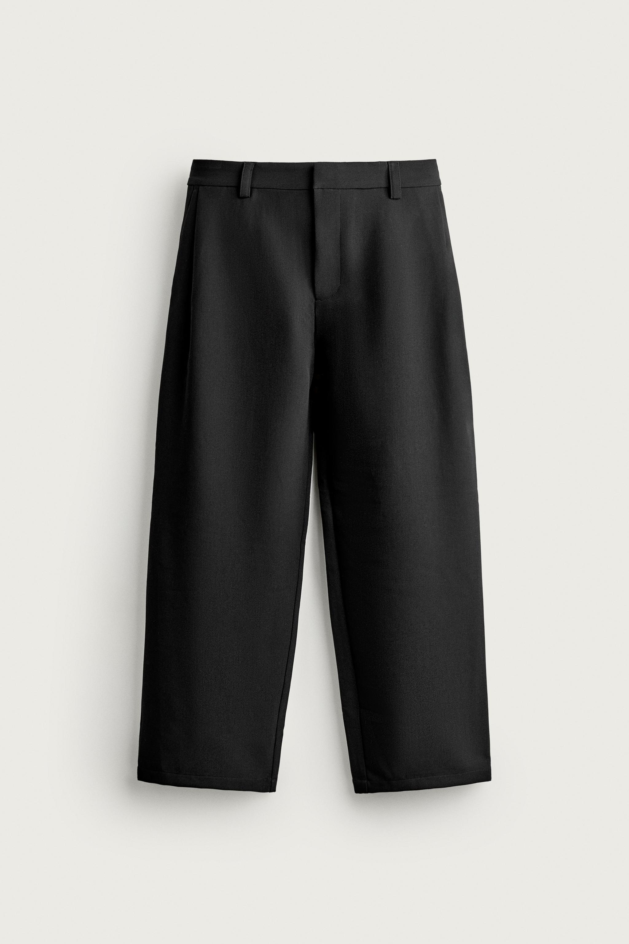 SIDE PLEAT WIDE-LEG TROUSERS — Black