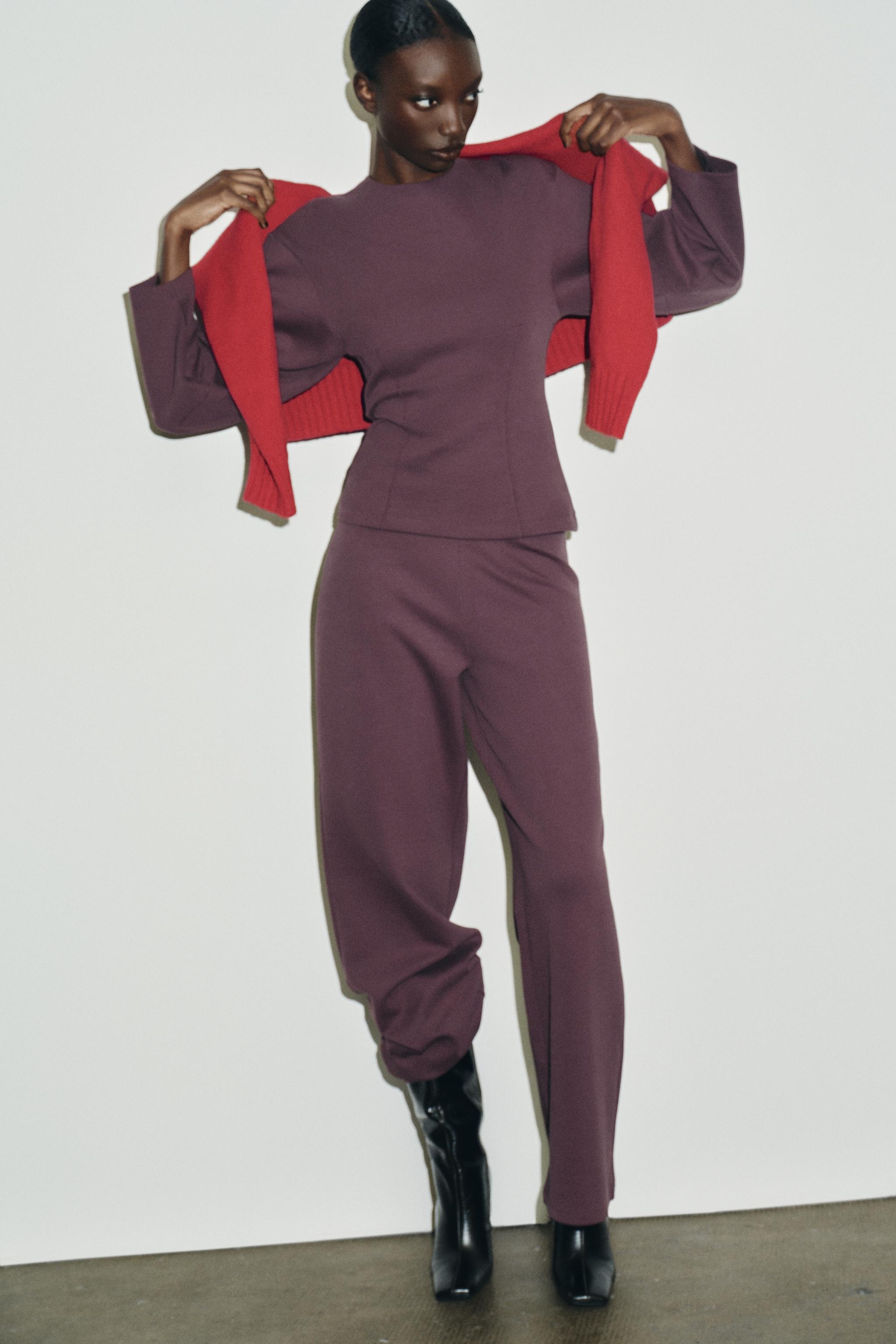 INTERLOCK JUMPER WITH DARTS