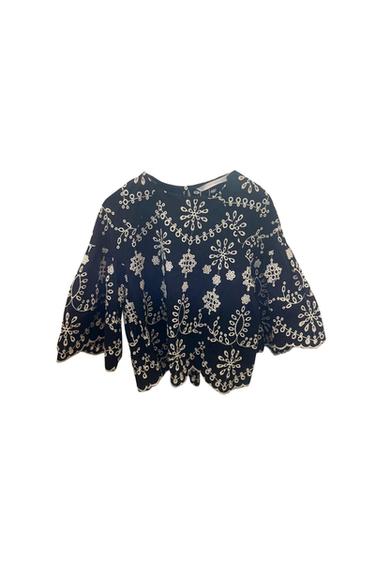 CAMISA PERFORADA