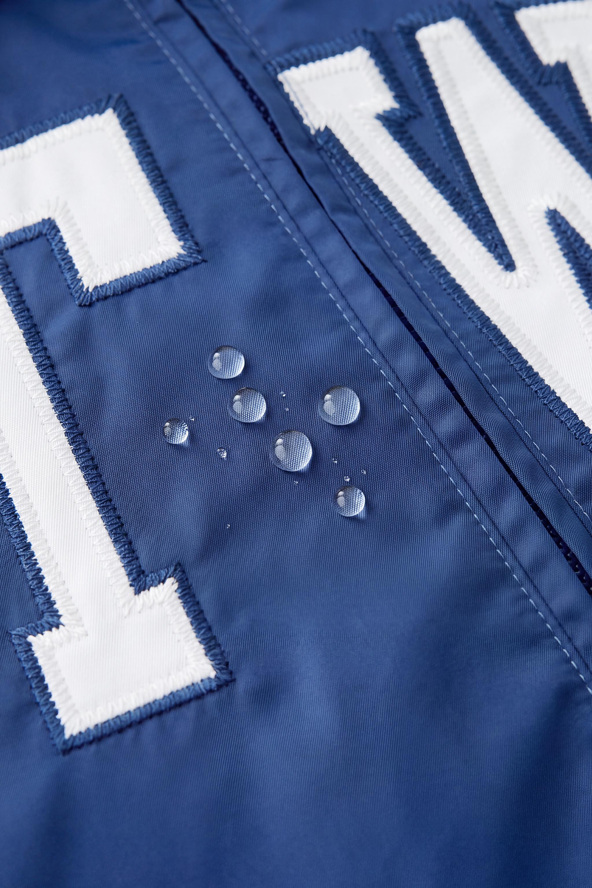 BLOUSON BOMBER VARSITY DÉPERLANT