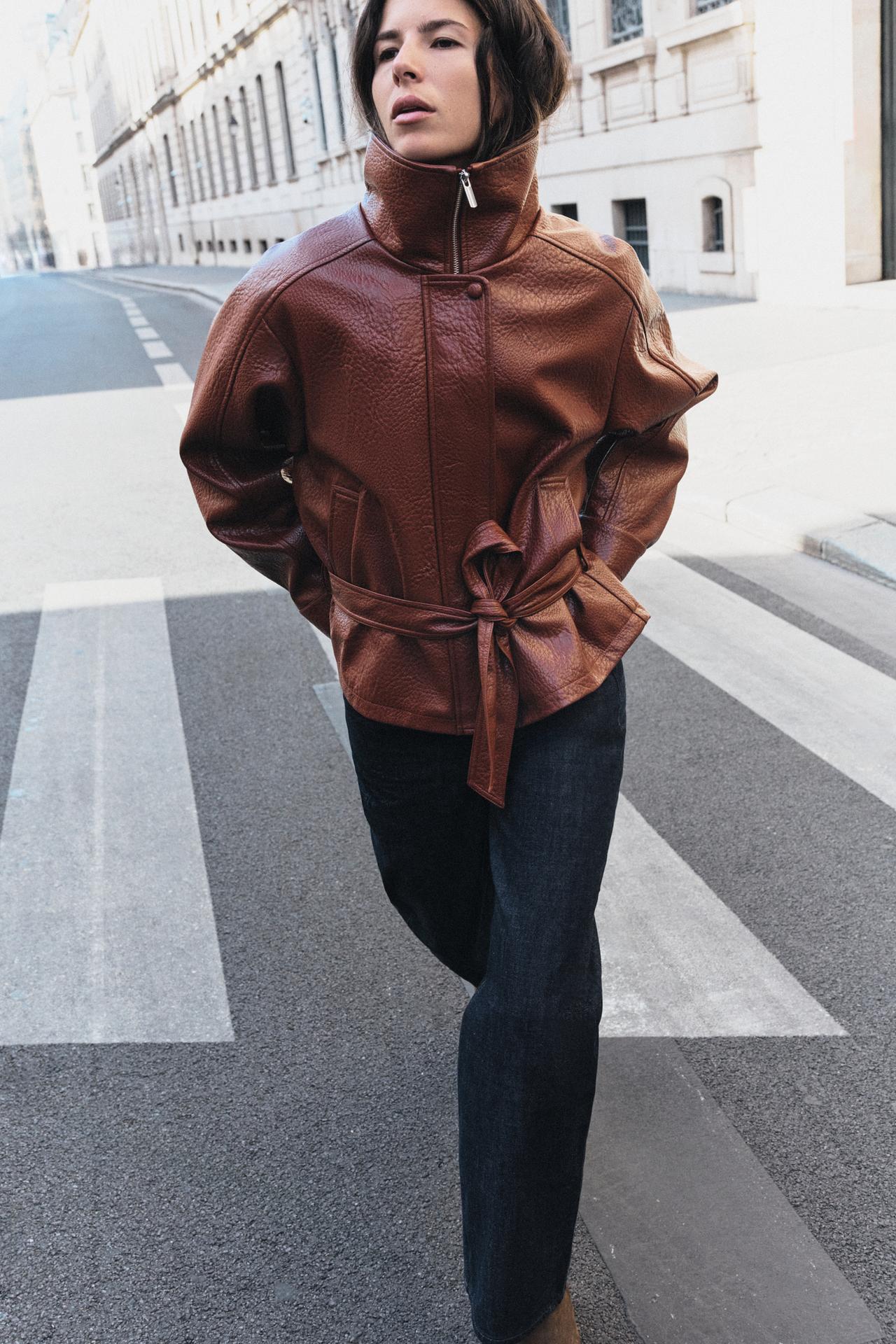 LEATHER EFFECT BELTED JACKET