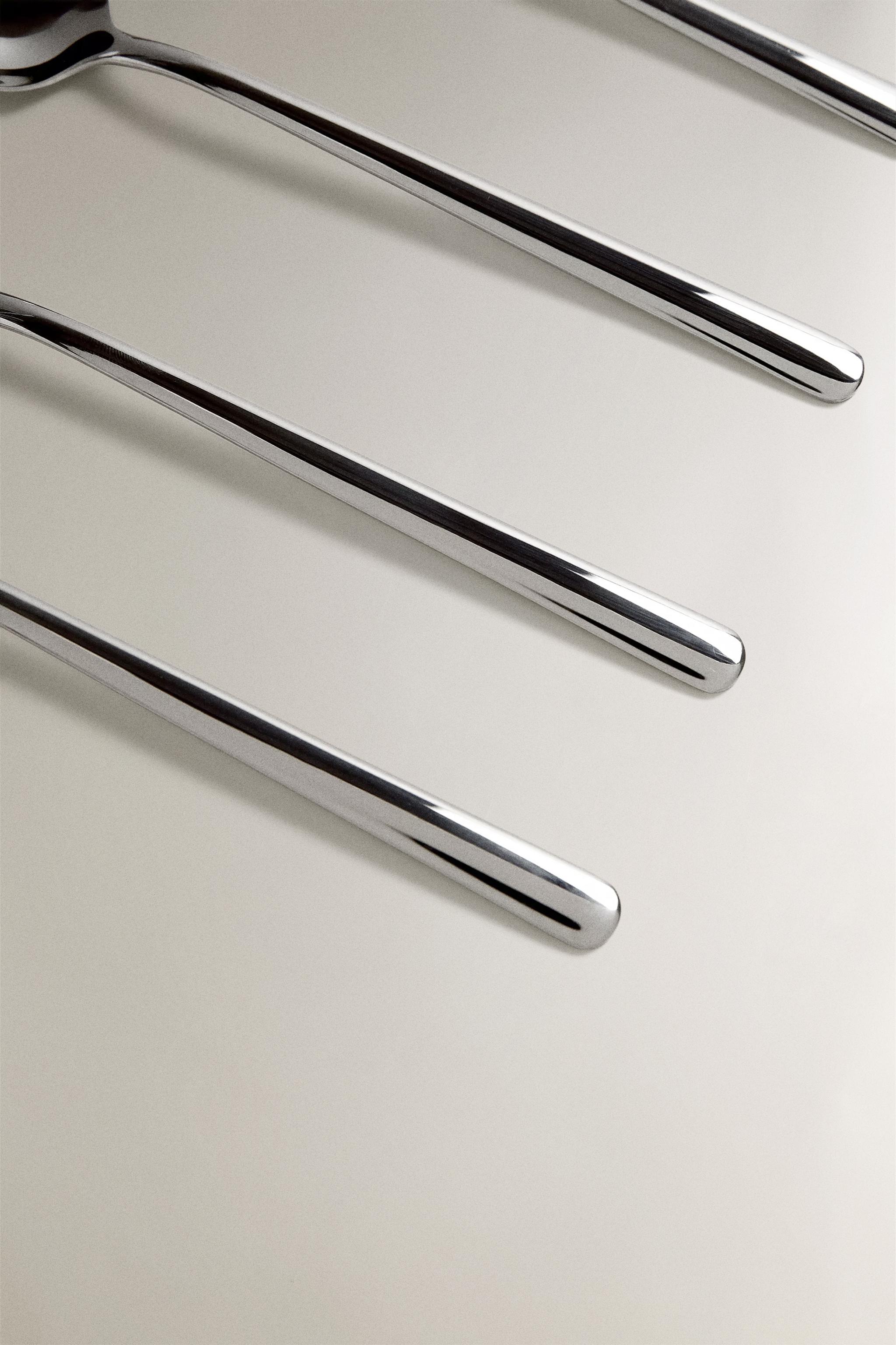 SET OF SHINY STEEL SPOONS (SET OF 4)