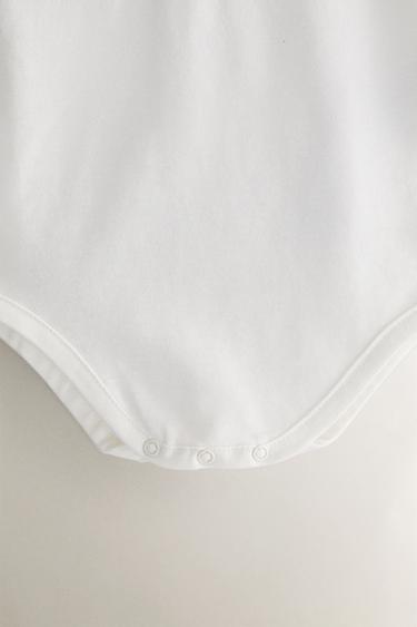 BAVOIR ENFANT BRODERIE FLEURS - Blanc cassé de Zara - Image 3