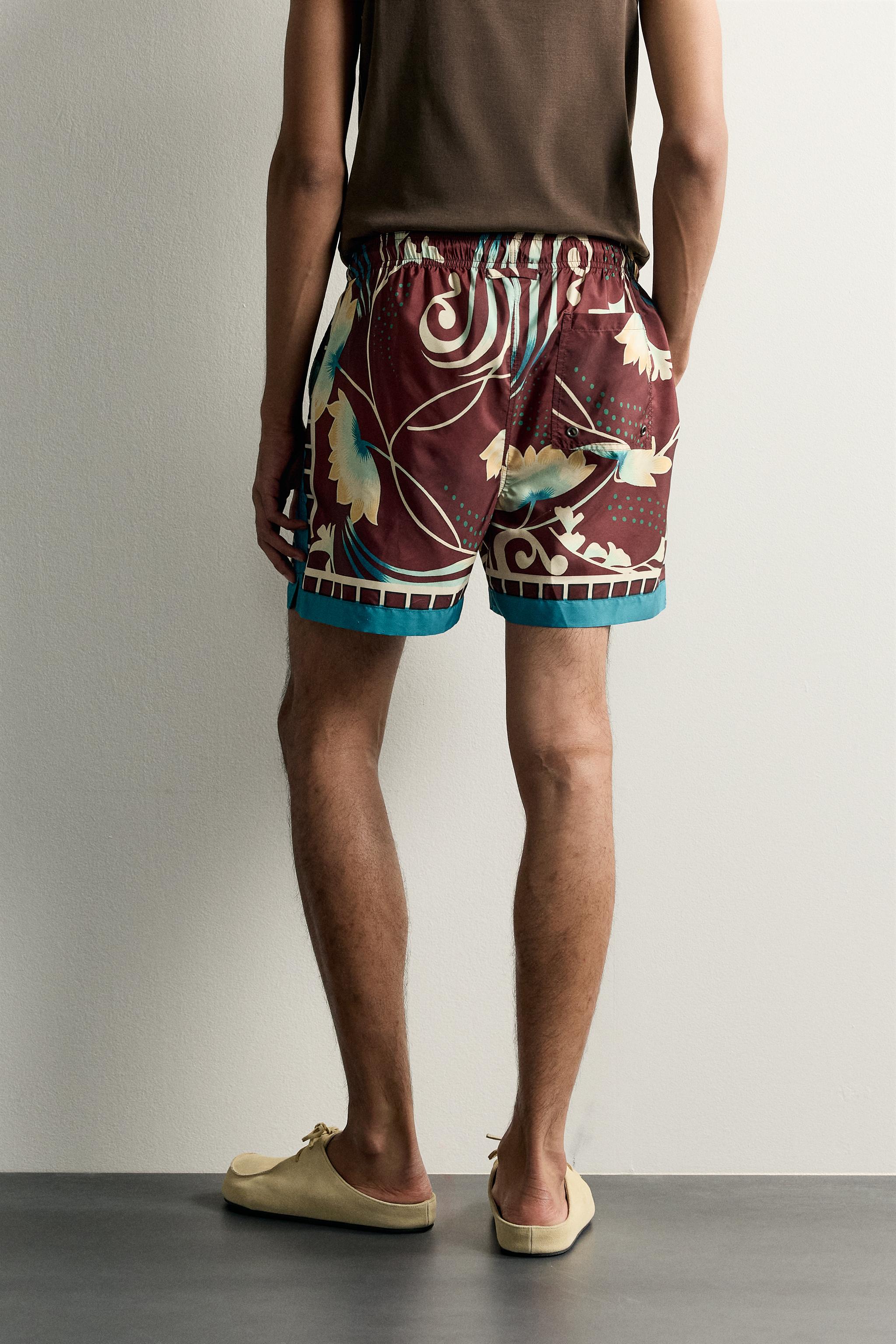 LIMITED EDITION MIXED PRINT SWIM SHORTS