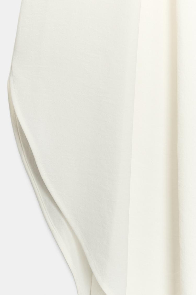Pantalones fluidos con aberturas 8