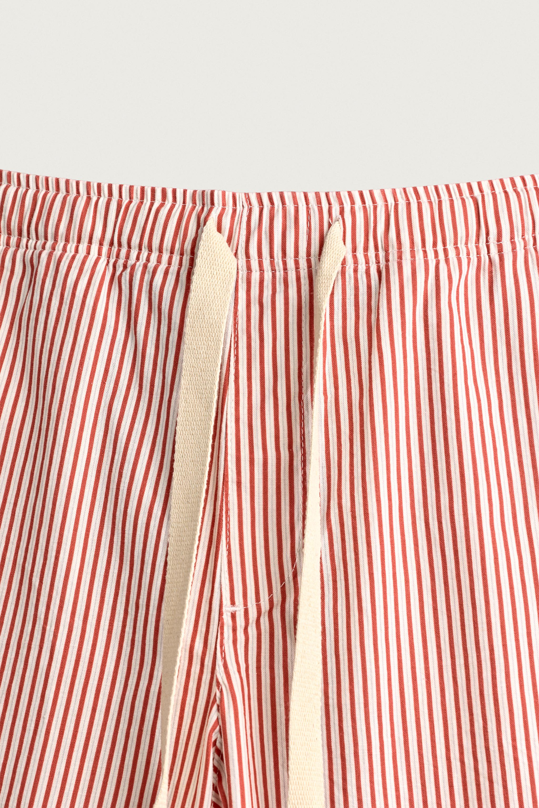 STRIPED BAGGY FIT PANTS
