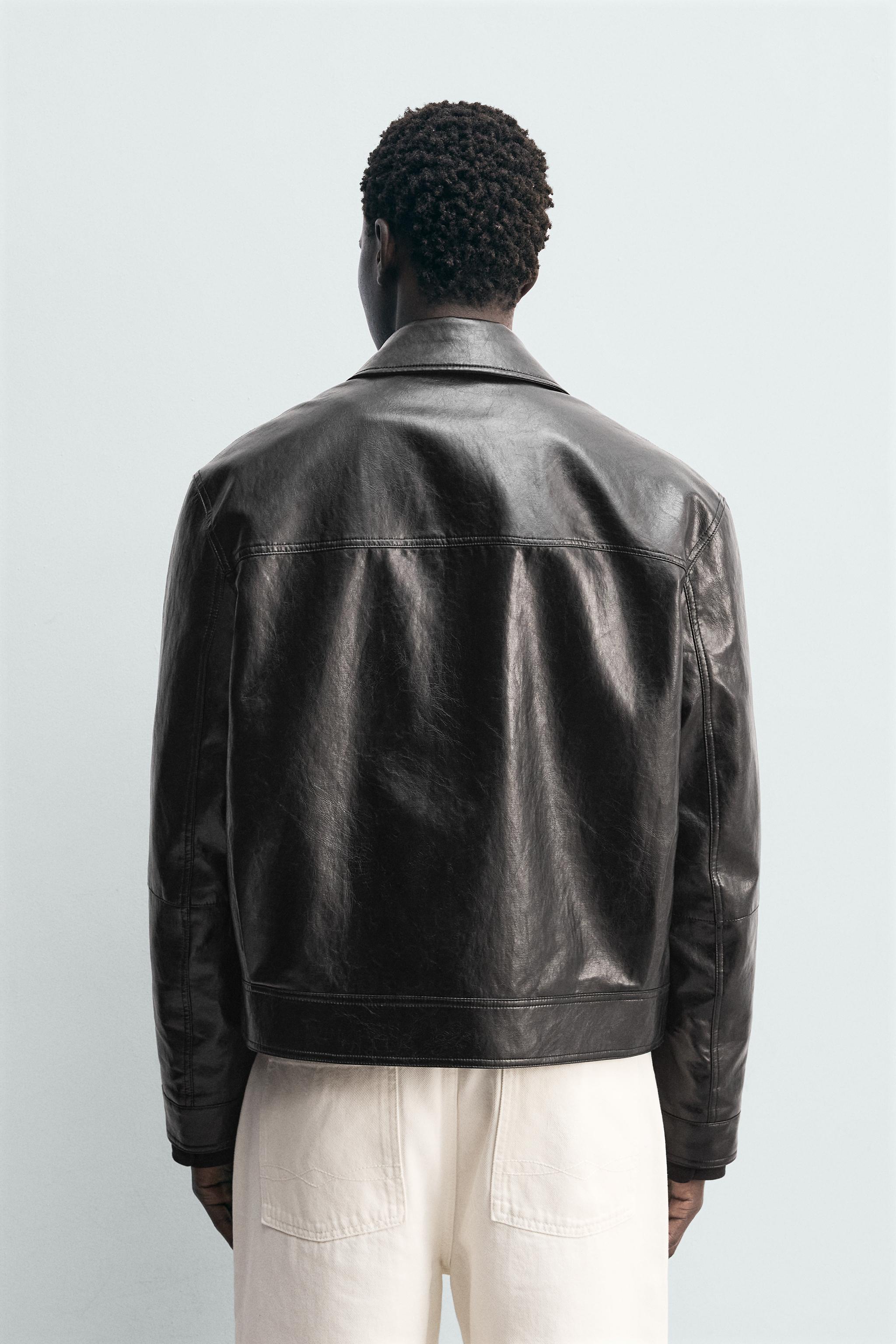 BLOUSON EN MATIÈRE SYNTHÉTIQUE AVEC ALAMARS
