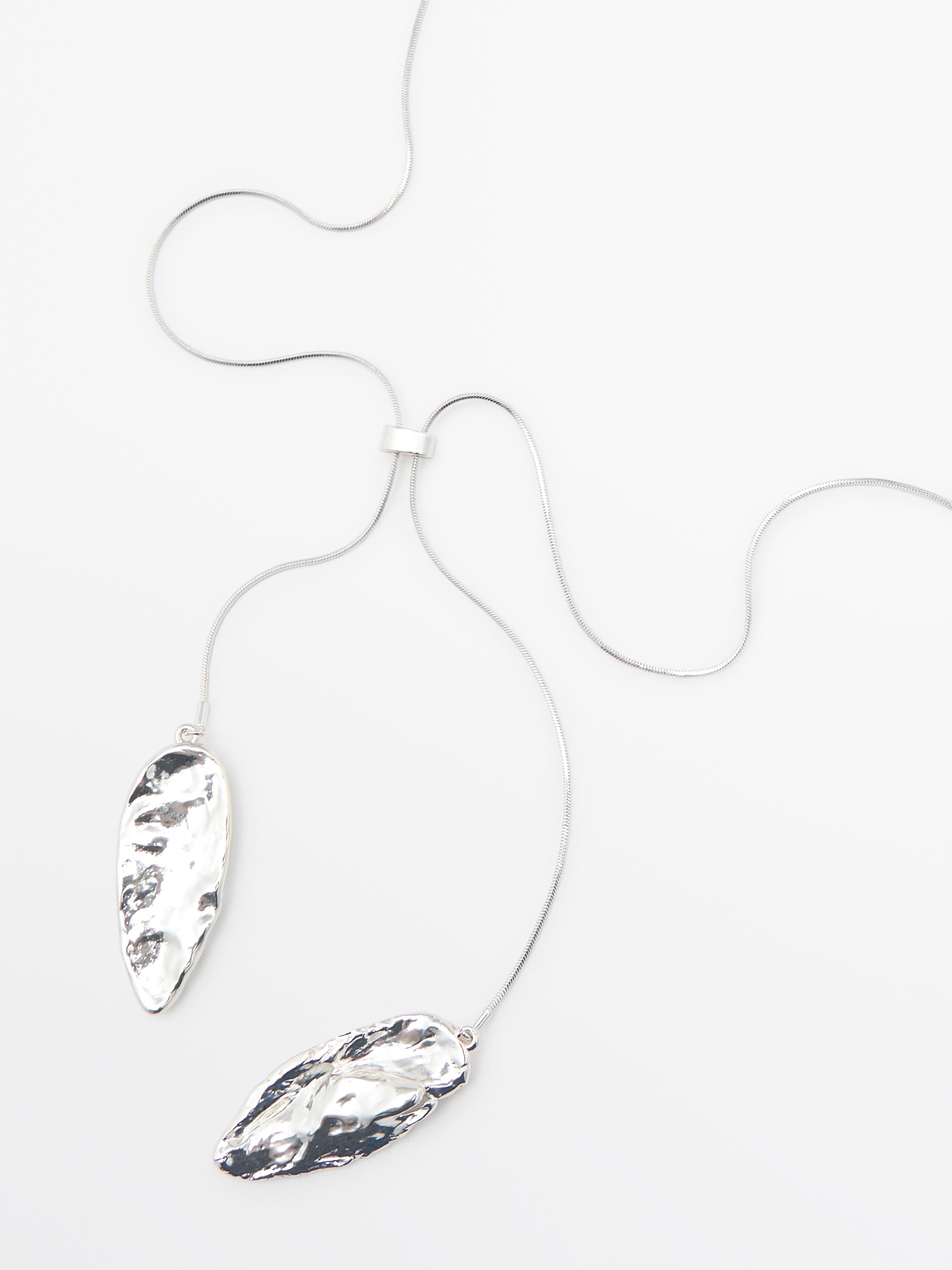 Collier pièces texturées réglable