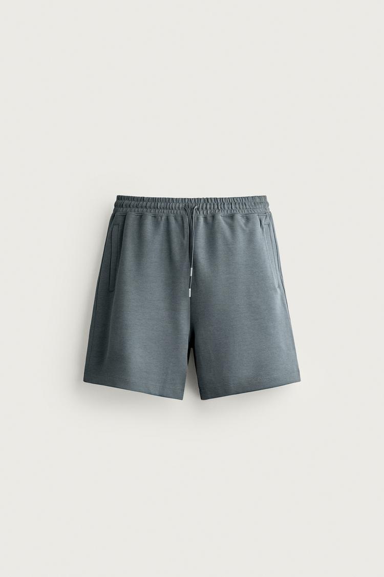 RELAXED FIT INTERLOCK JOGGING BERMUDA SHORTS