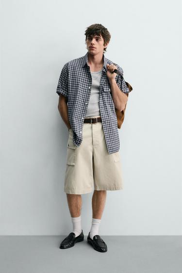 CHEMISE À CARREAUX AVEC POCHE - 981 de Zara
