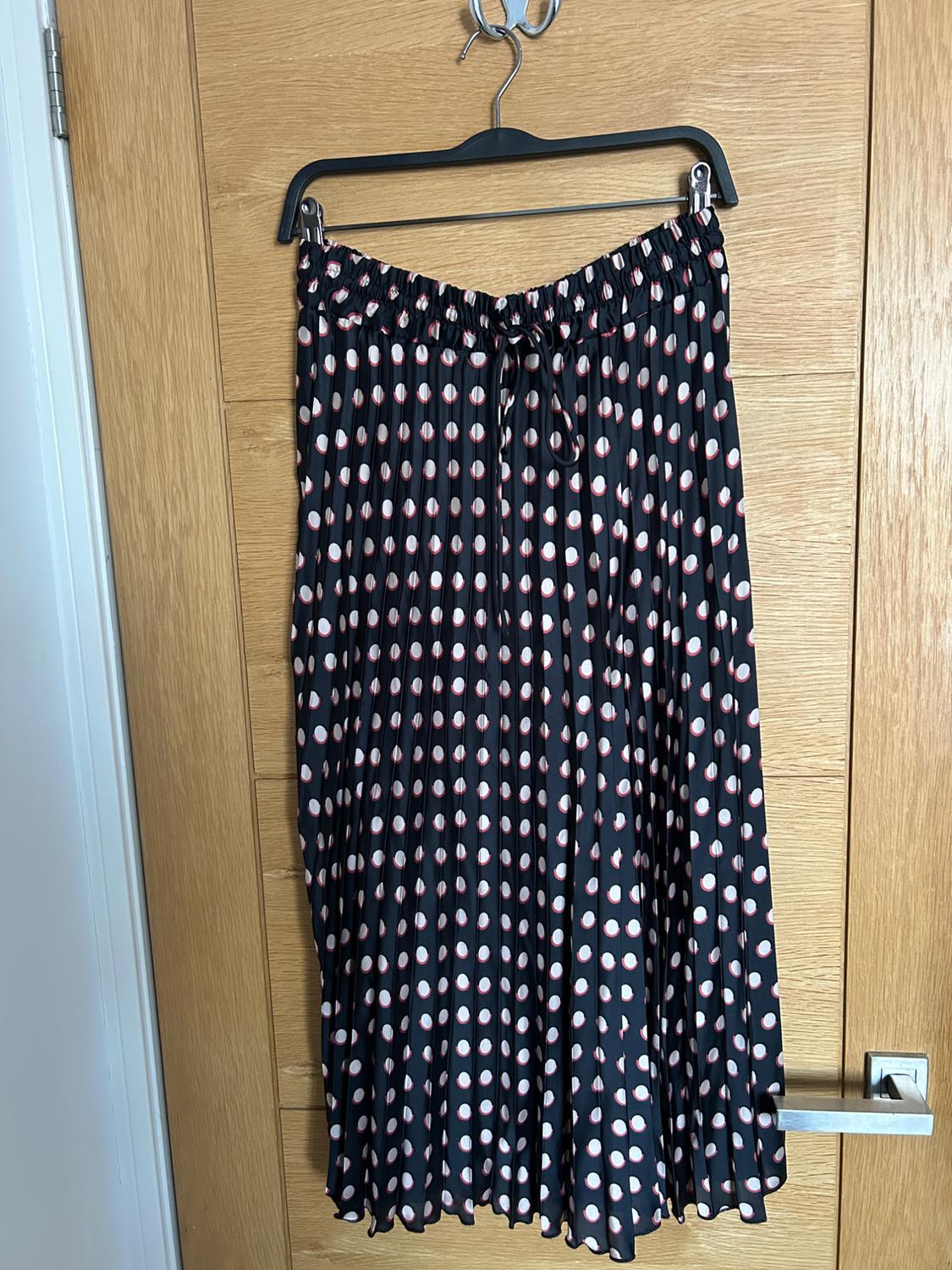 POLKA DOT PLEATED SKIRT