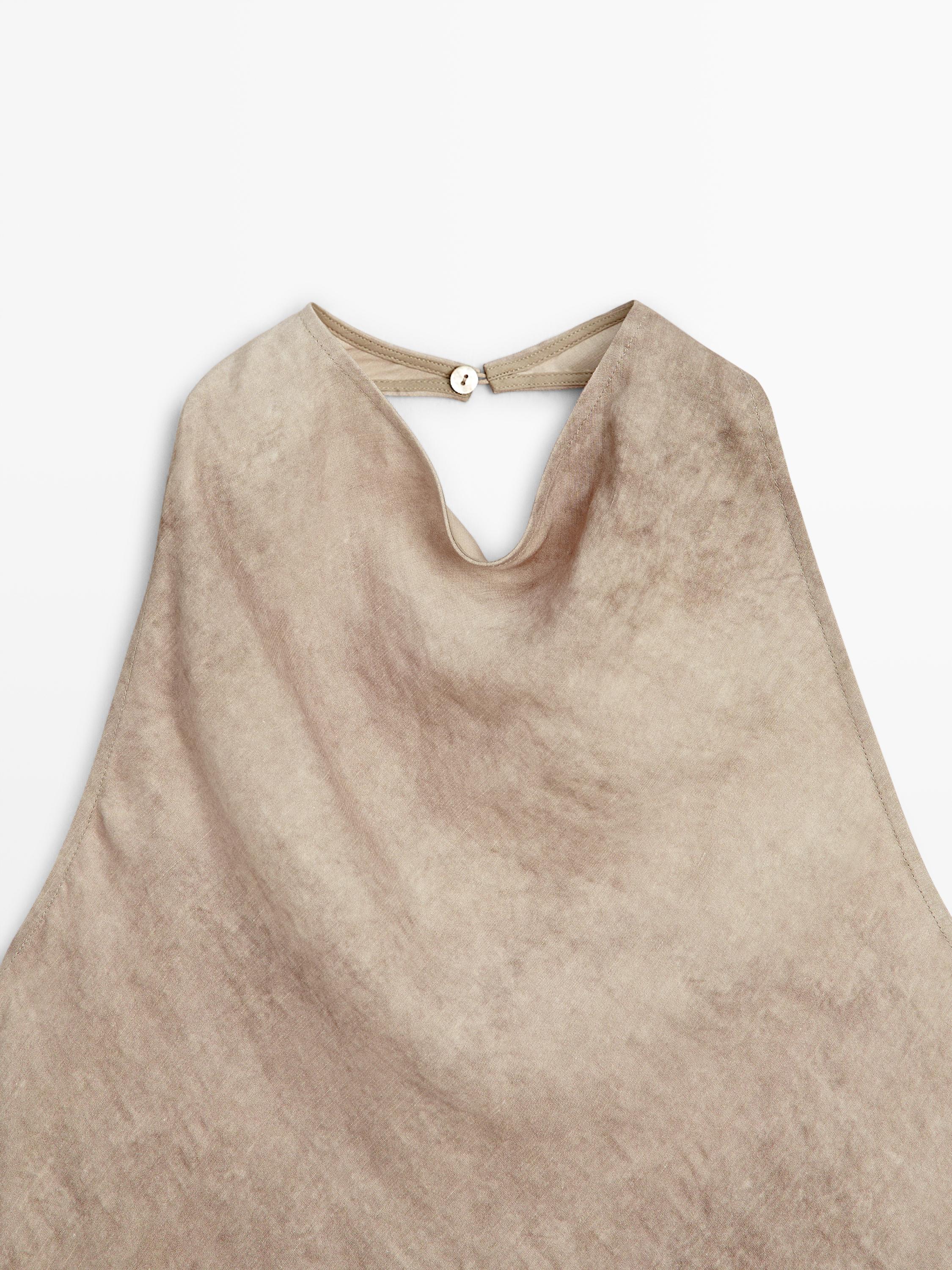 Worn effect halter top