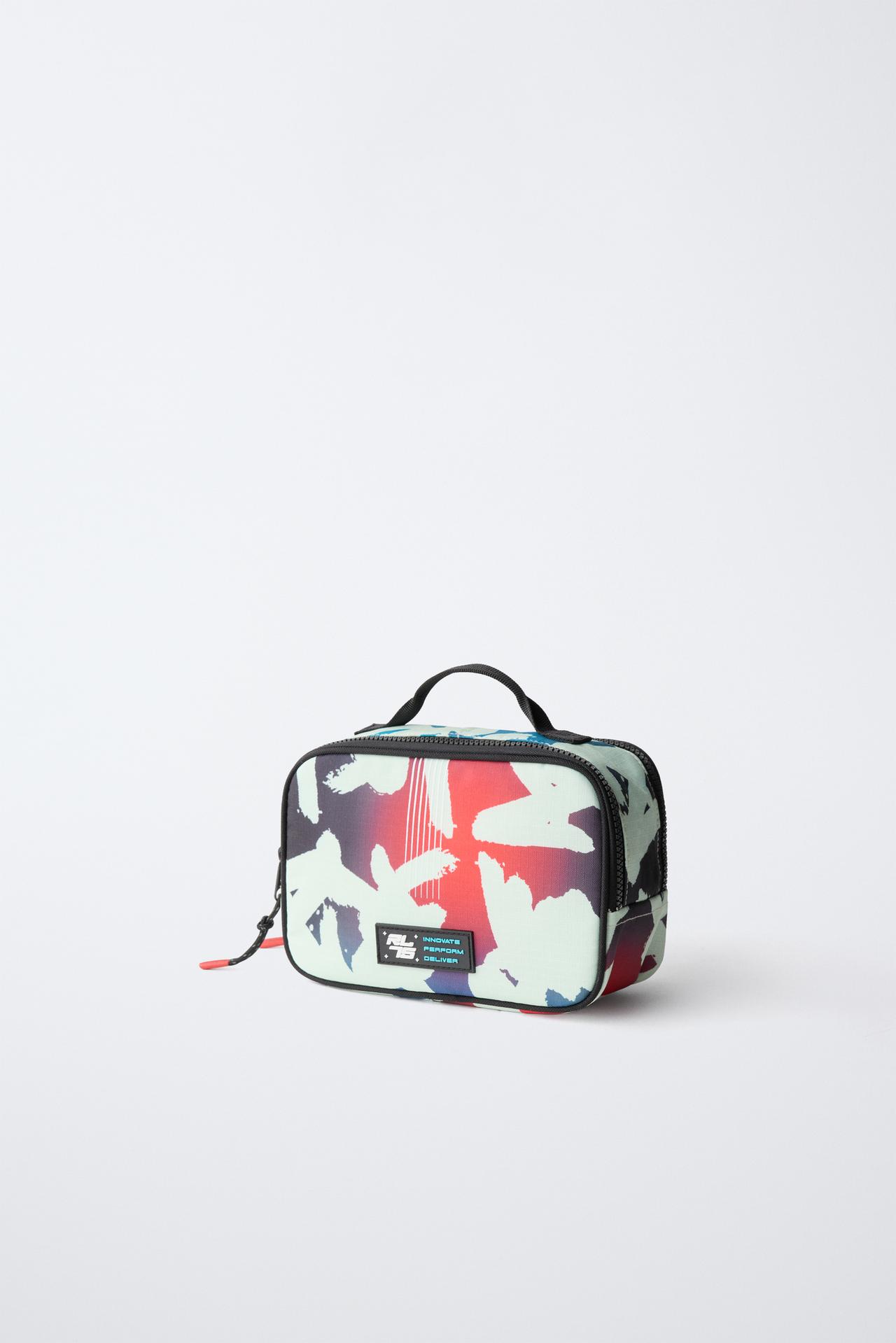 GRAPHIC TRAVEL TOILETRY BAG — Multi-color