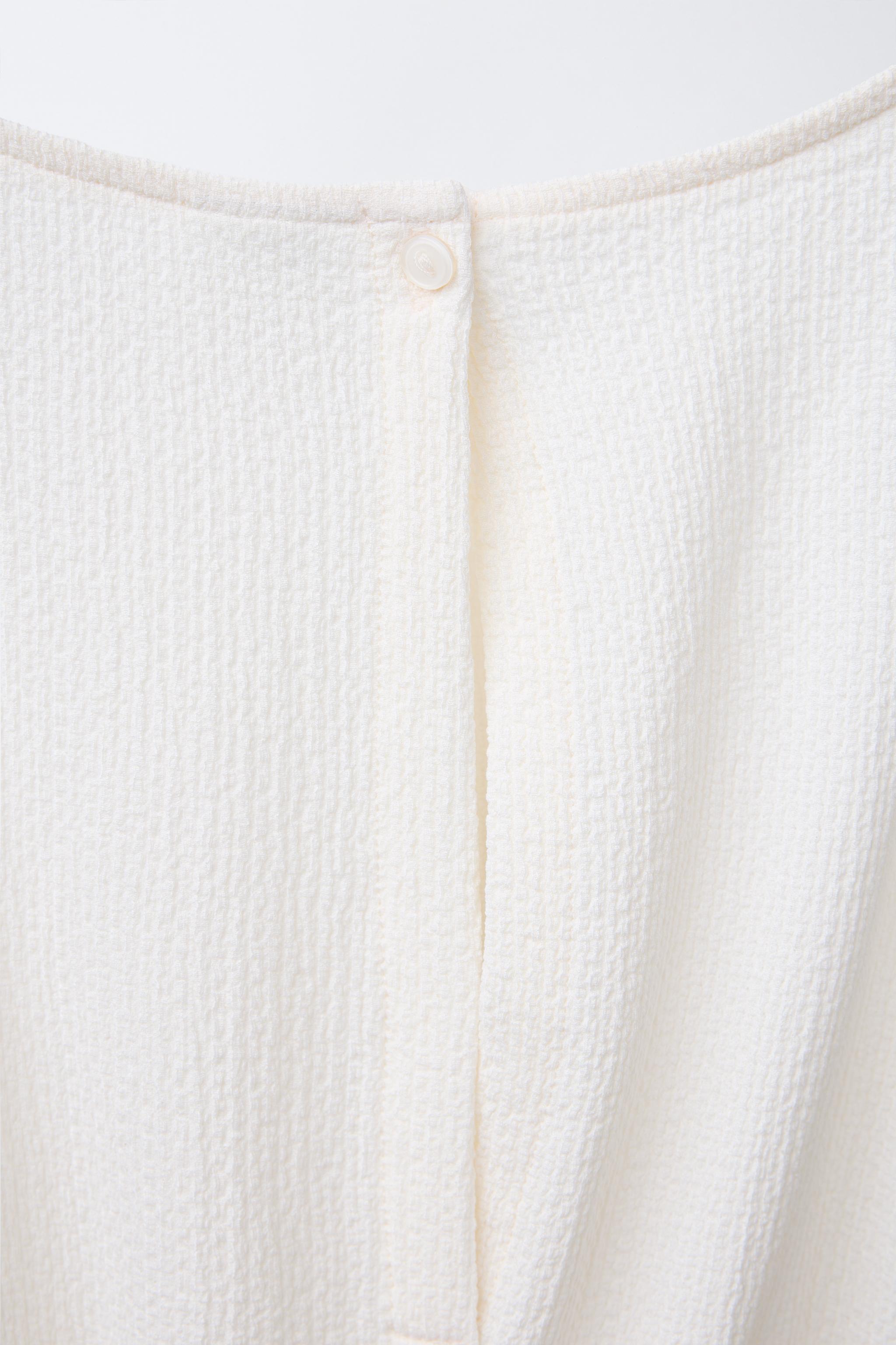 TEXTURED CUT-OUT TIE LONG JUMPSUIT