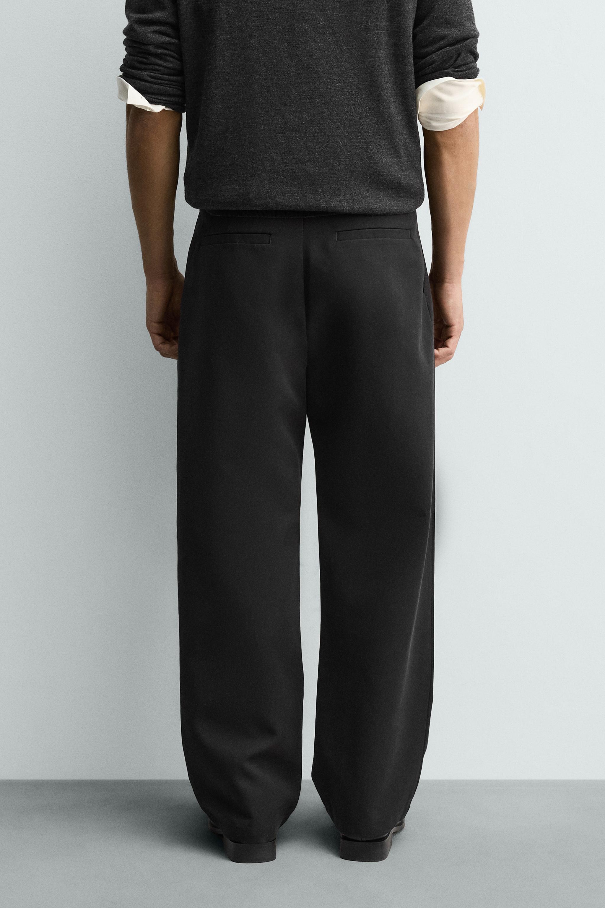 PANTALON COUPE LARGE À PLIS