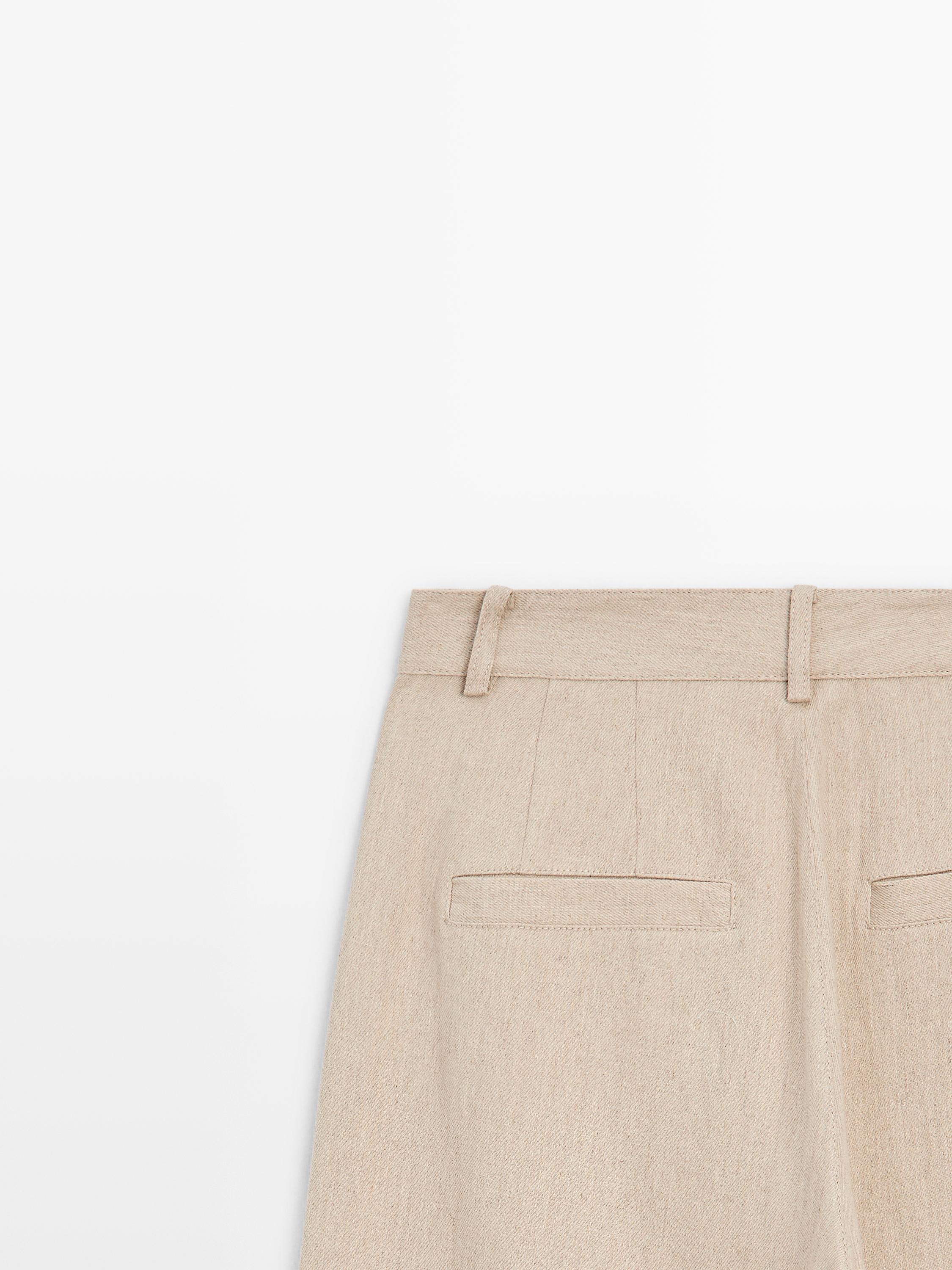 Loose fit high-waist trousers