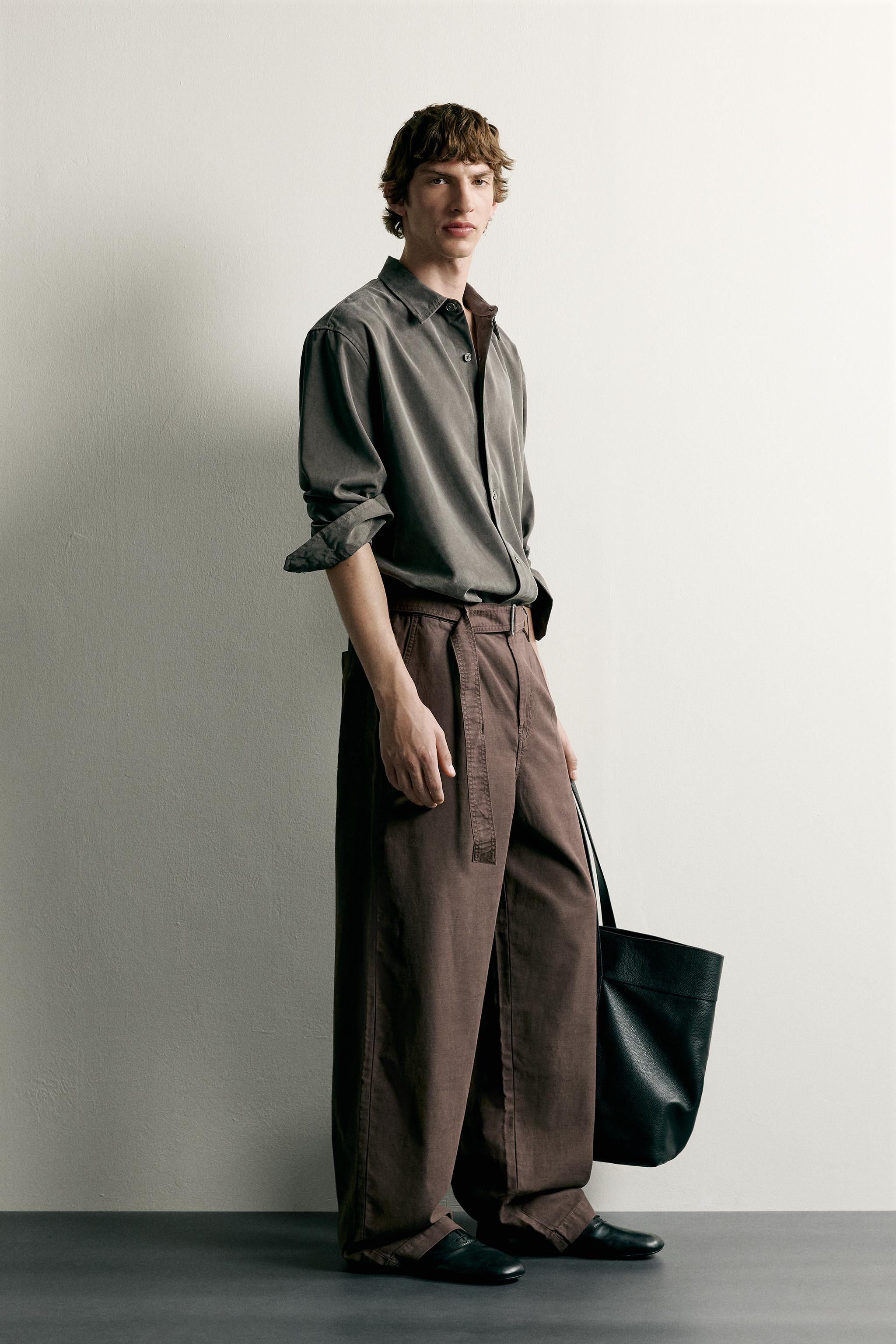 RELAXED FIT BELTED PLEATED PANTS