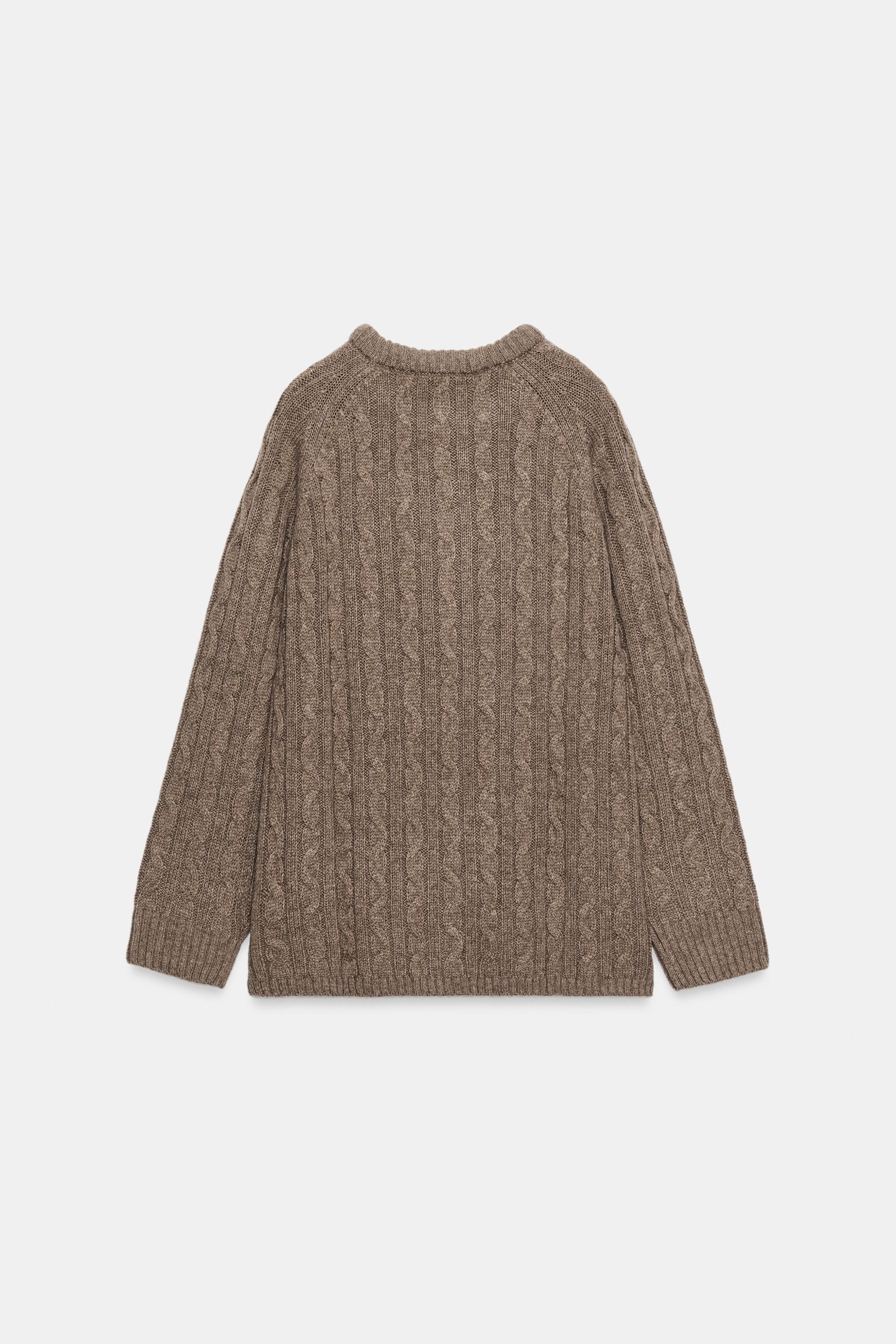 CABLE KNIT SWEATER