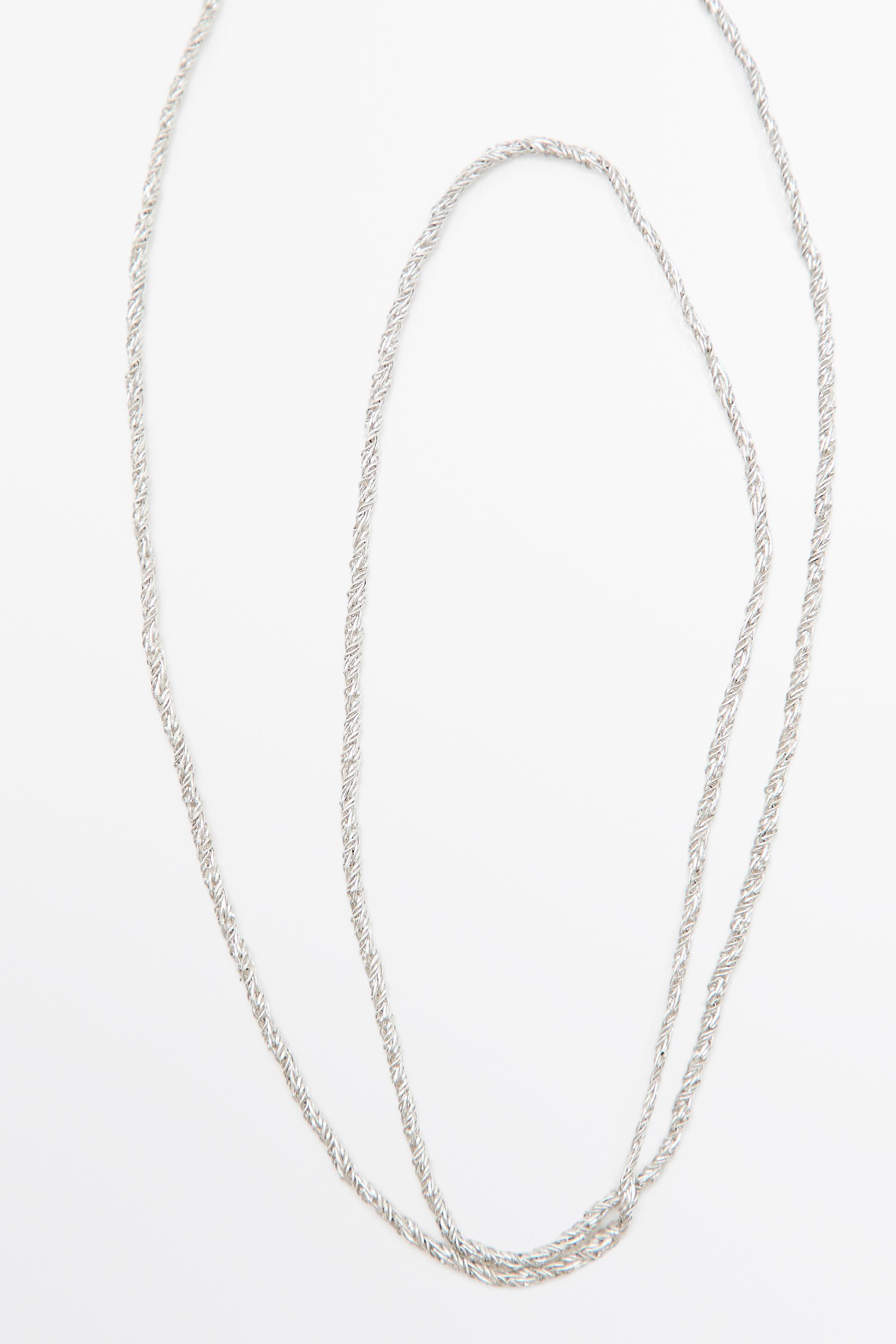 Collier long pièce panier