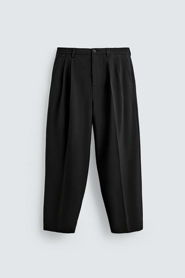 PANTALÓN WIDE FIT PLIEGUES - Negro de Zara - Imagen 0