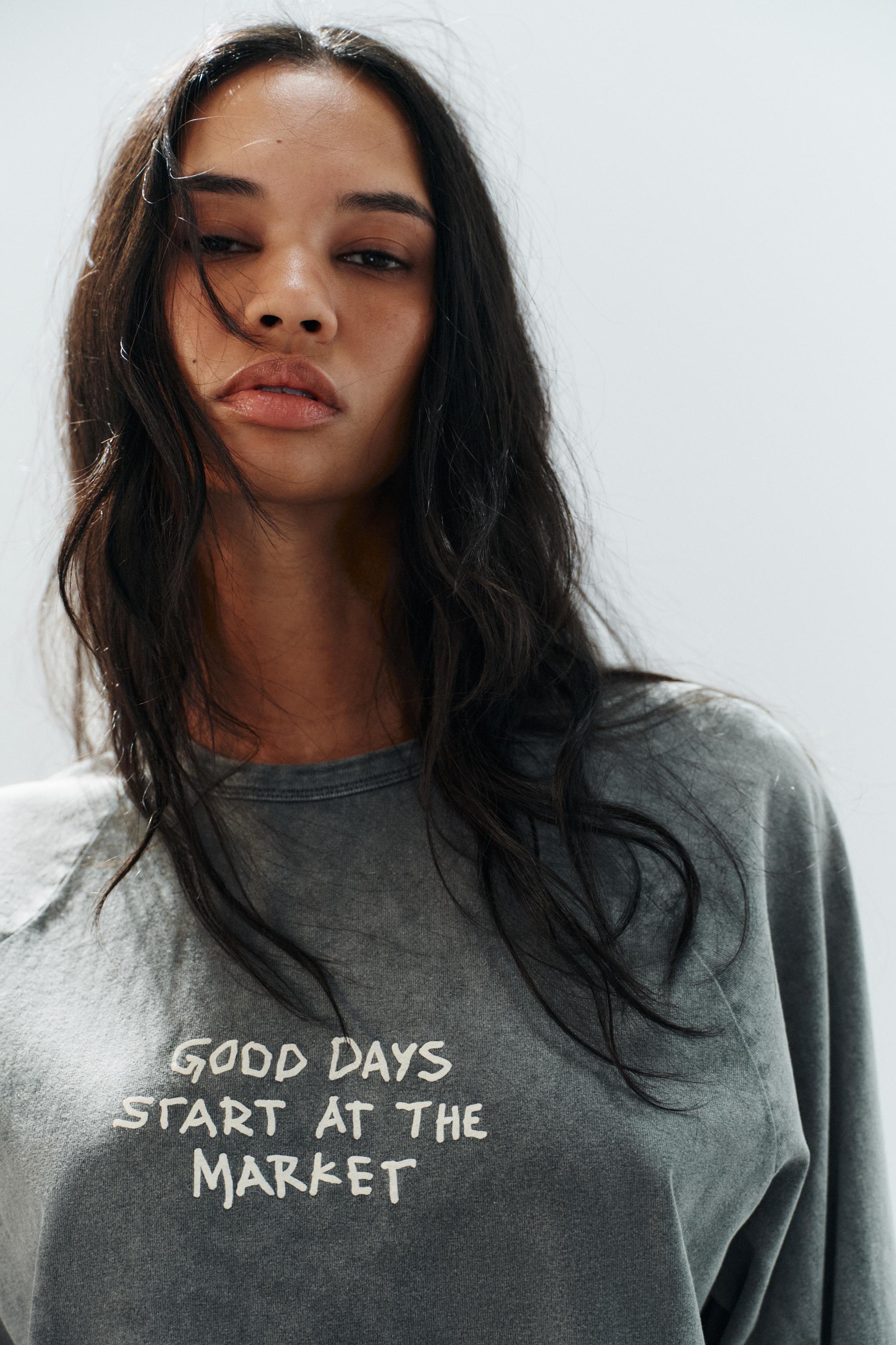 T-SHIRT À EFFET DÉLAVÉ ET DESSINS
