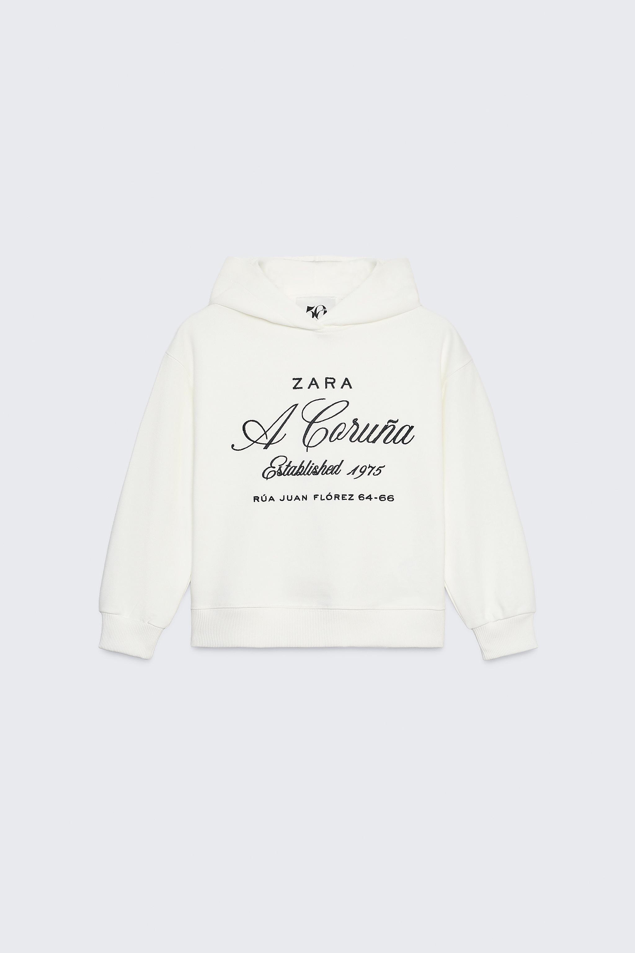 SWEAT À CAPUCHE INSCRIPTION BRODÉE 50TH ANNIVERSARY
