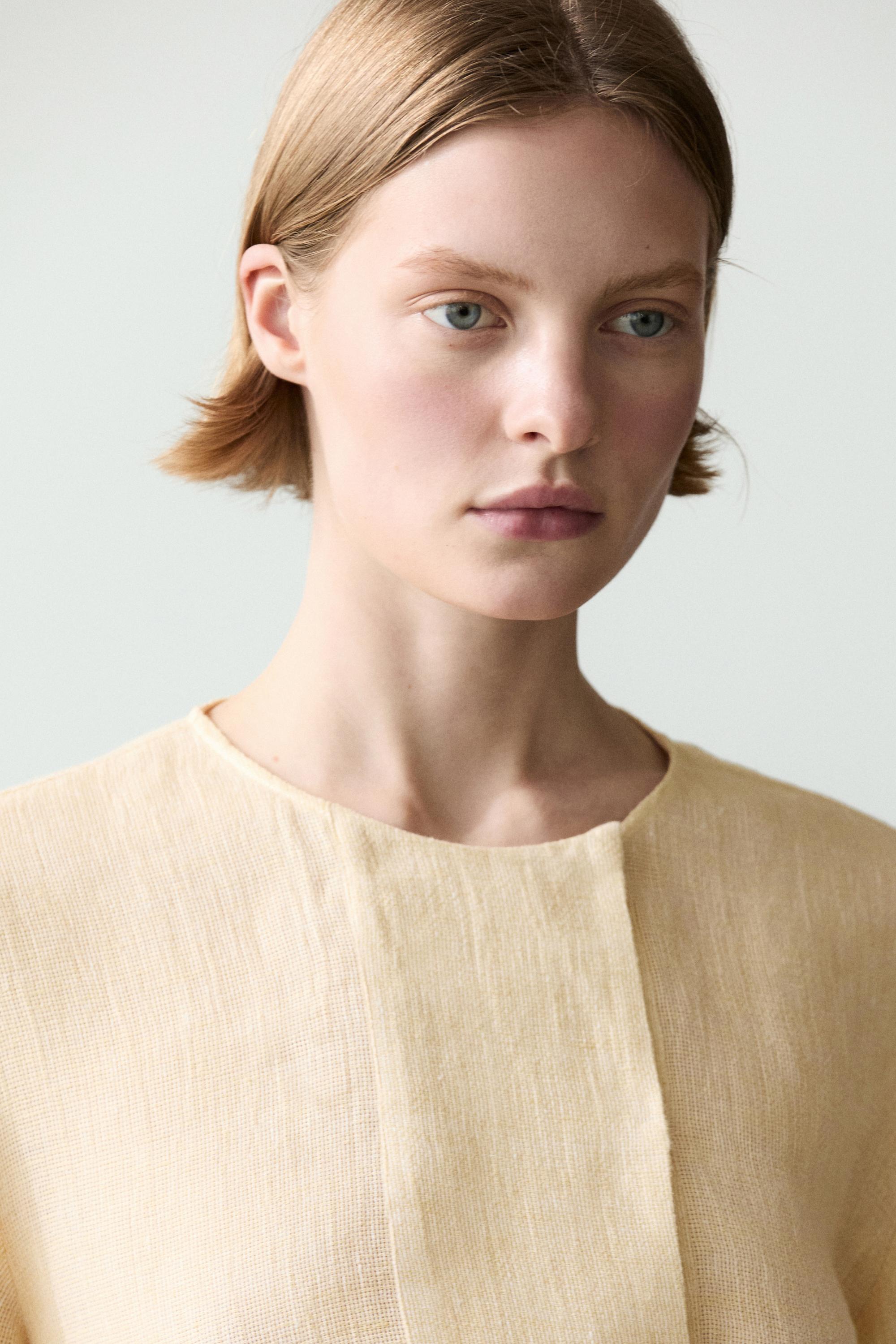 Flowing linen blouse with chest detail
