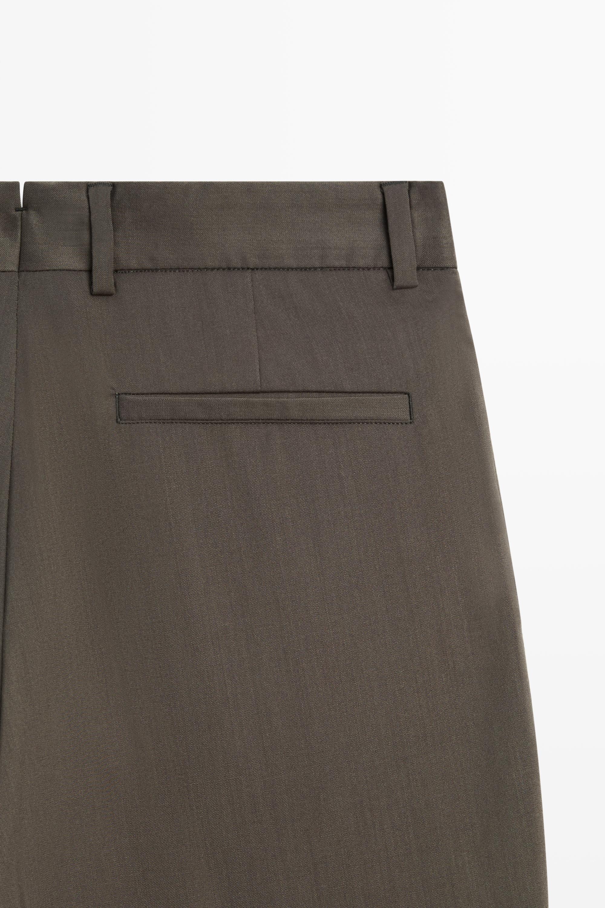 Pantalon relaxed fit à pinces 100 % laine froide