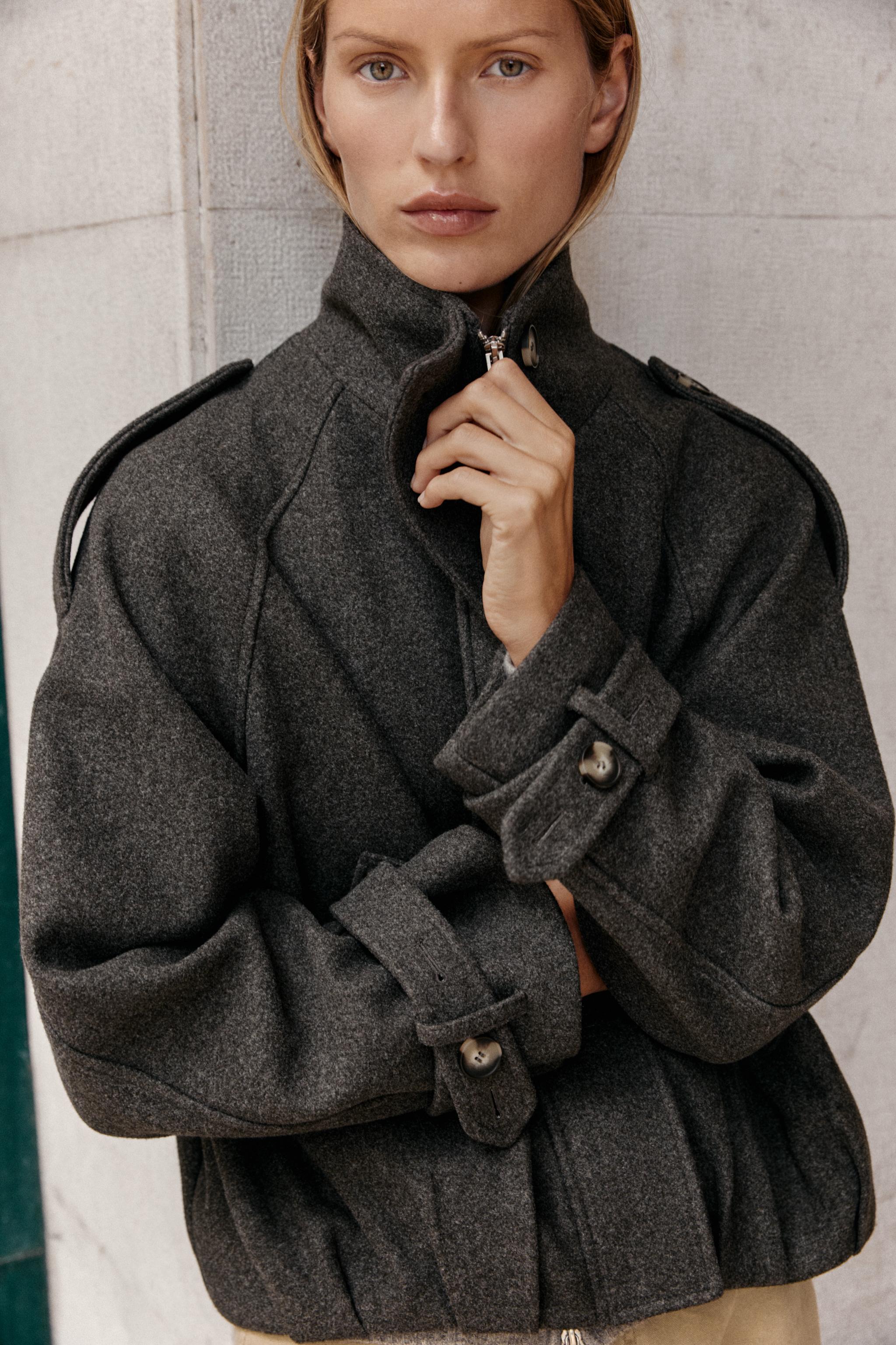 BOMBER JACKET WITH TAB DETAILS