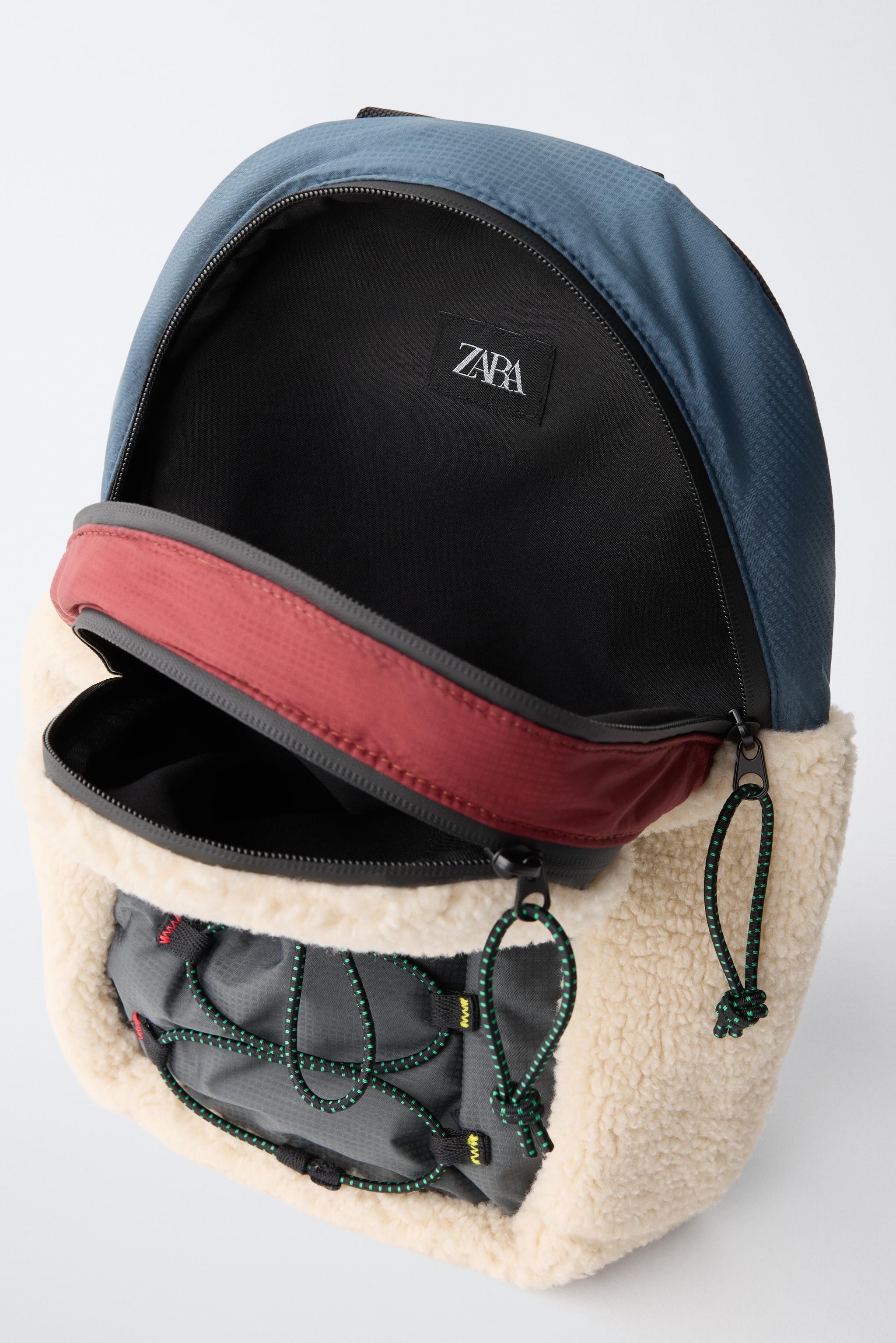 TECHNICAL FAUX SHEARLING CROSSBODY BAG