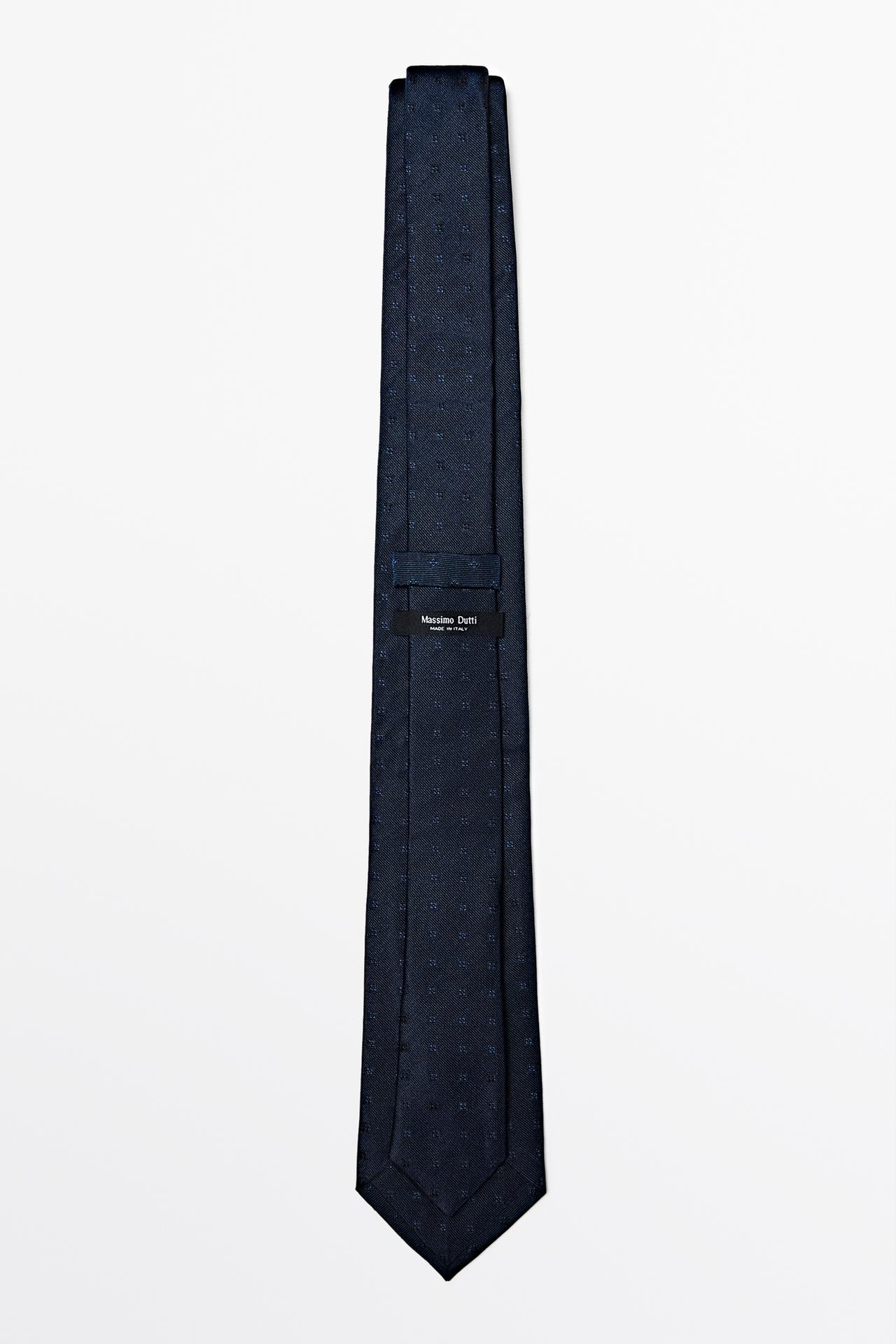 100% silk tie with embroidered detail — Navy blue