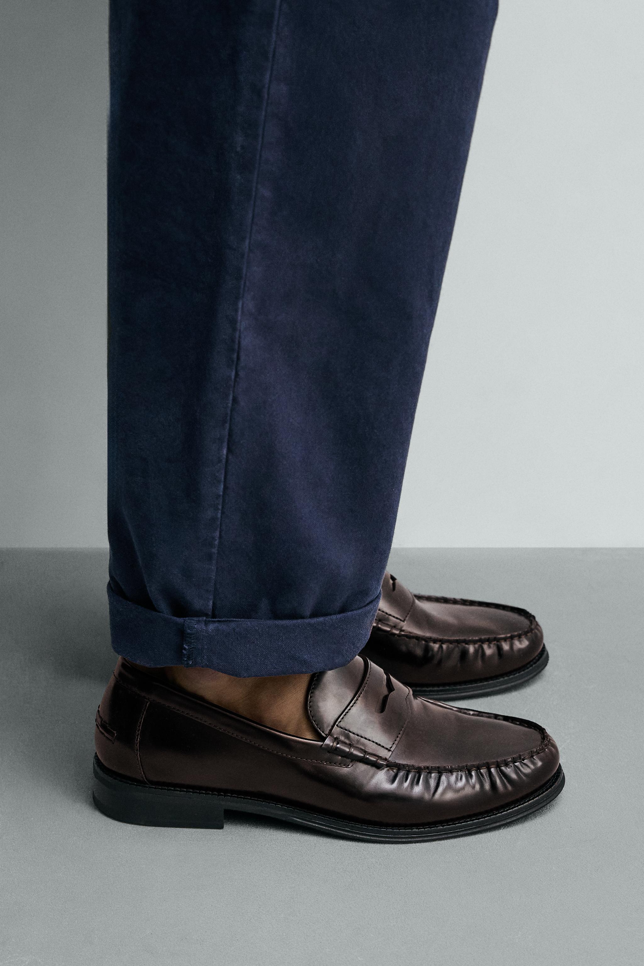 MOCASSINS EN CUIR AVEC MASQUE
