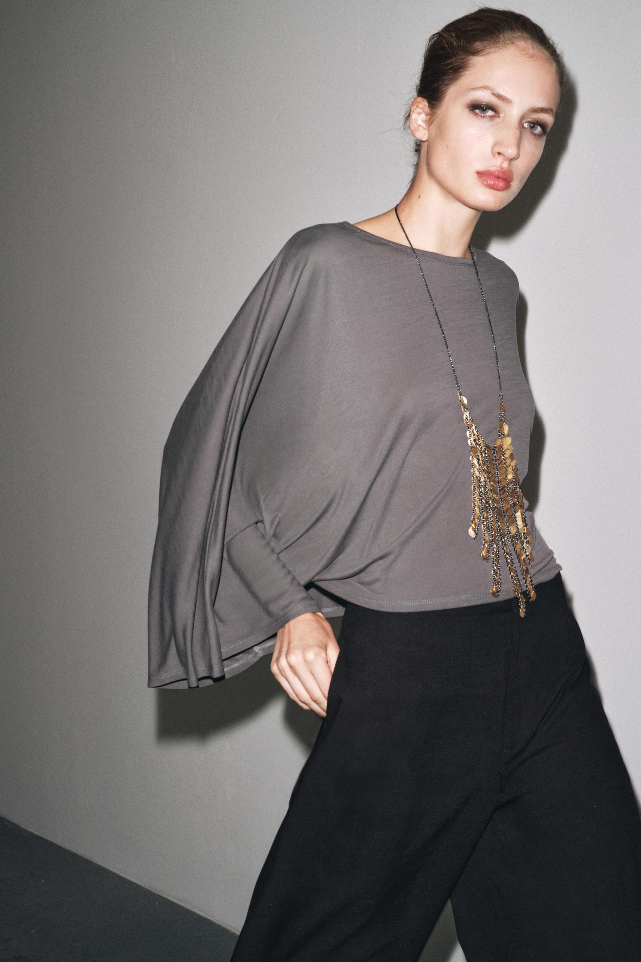 ASYMMETRIC FLOWY CAPE