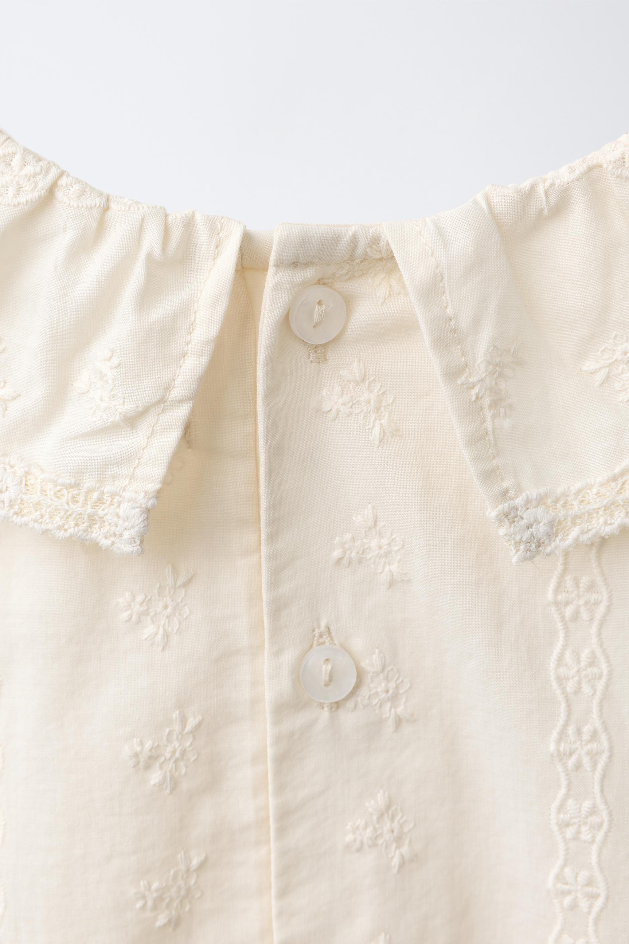 EMBROIDERED BODYSUIT
