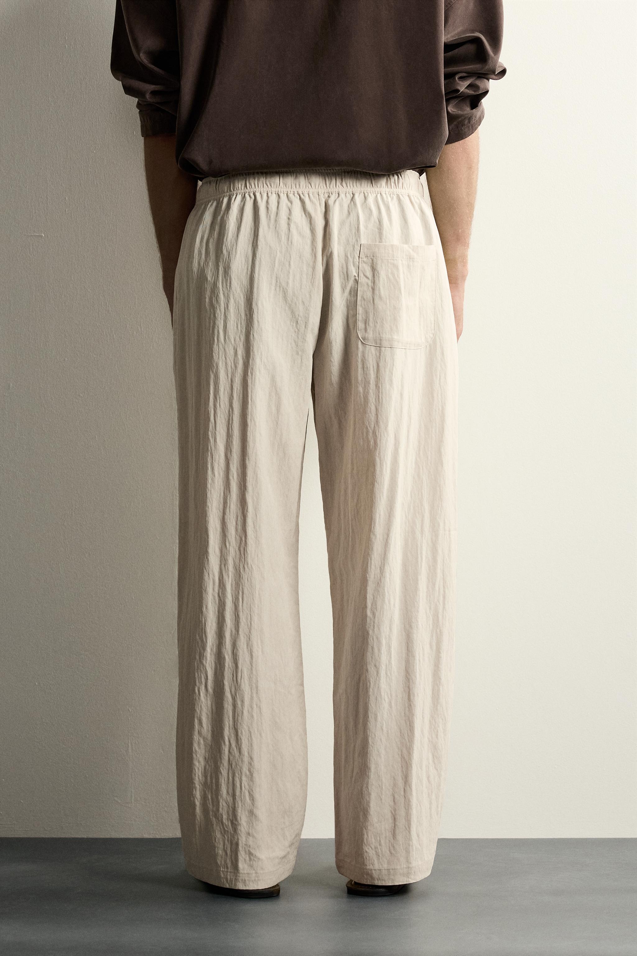 CRINKLED EFFECT TECHNICAL RELAXED FIT PANTS - Beige | ZARA United