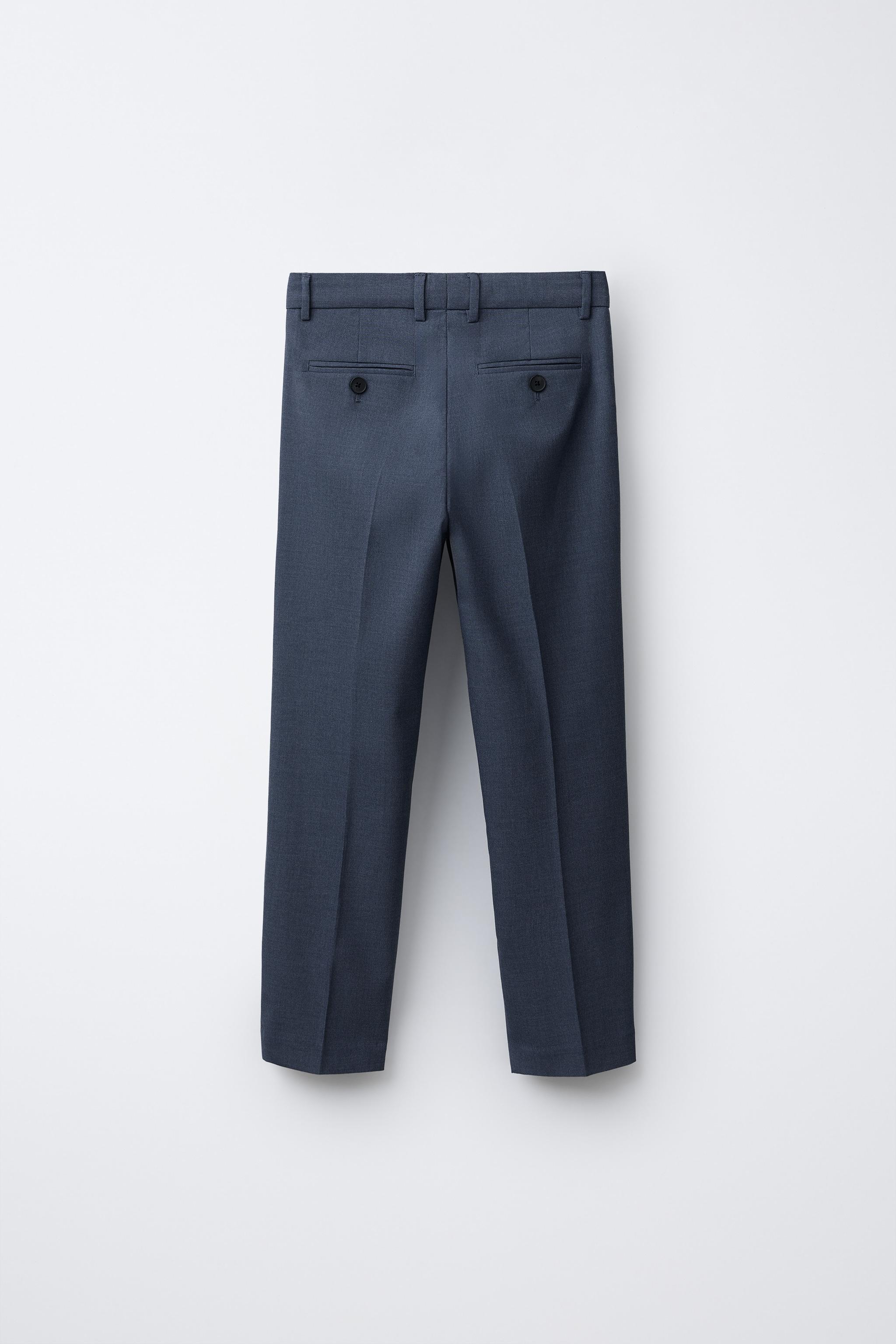 TEXTURED SUIT PANTS