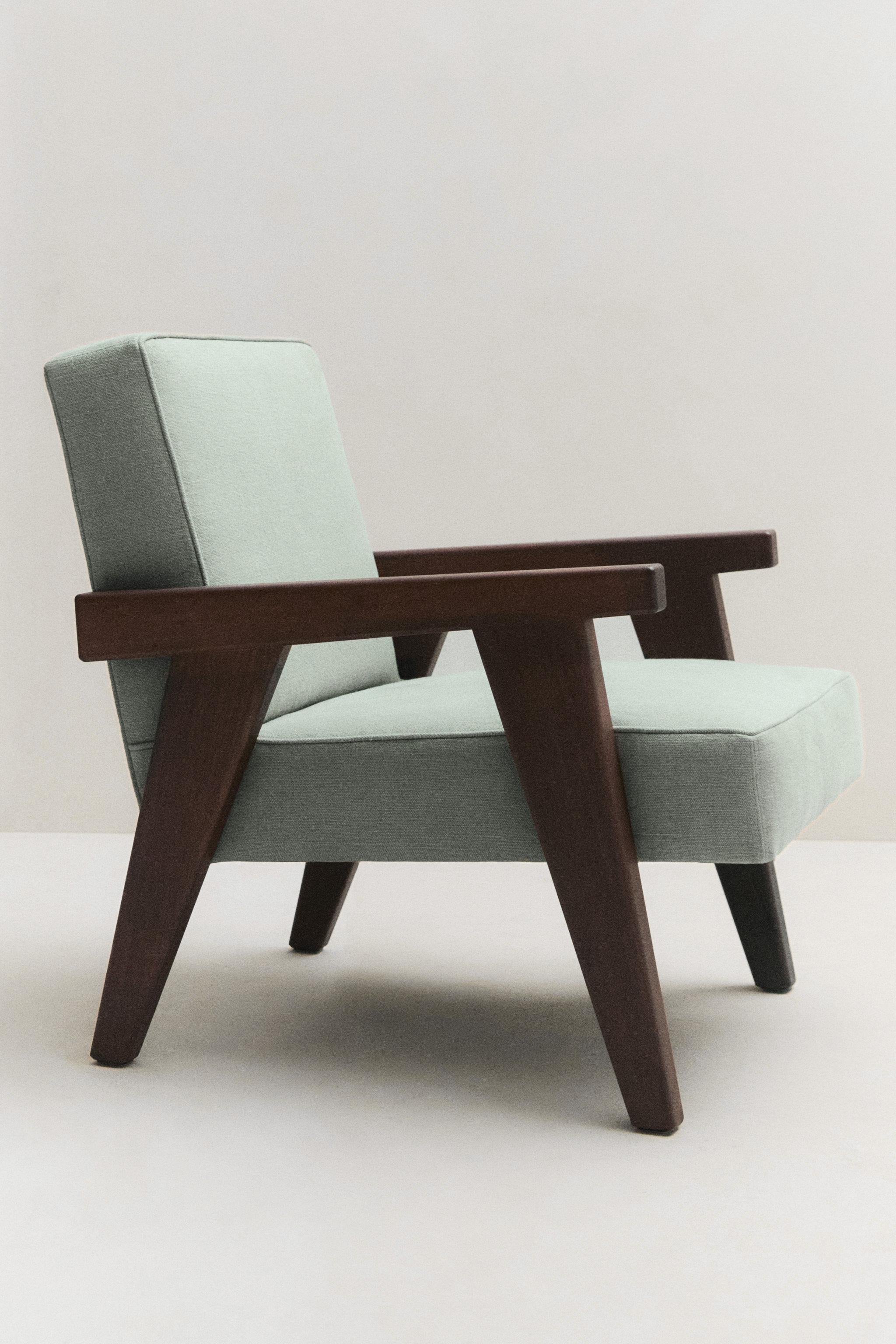 WALNUT WOOD AND LINEN ARMCHAIR — Light green