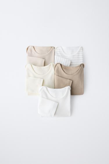 PACK CINCO BODIES LISOS Y RAYAS - Tostado de Zara - Imagen 0