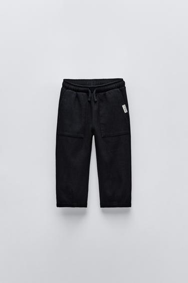 TEXTURED TROUSERS WITH LABEL APPLIQUÉ - Black by Zara