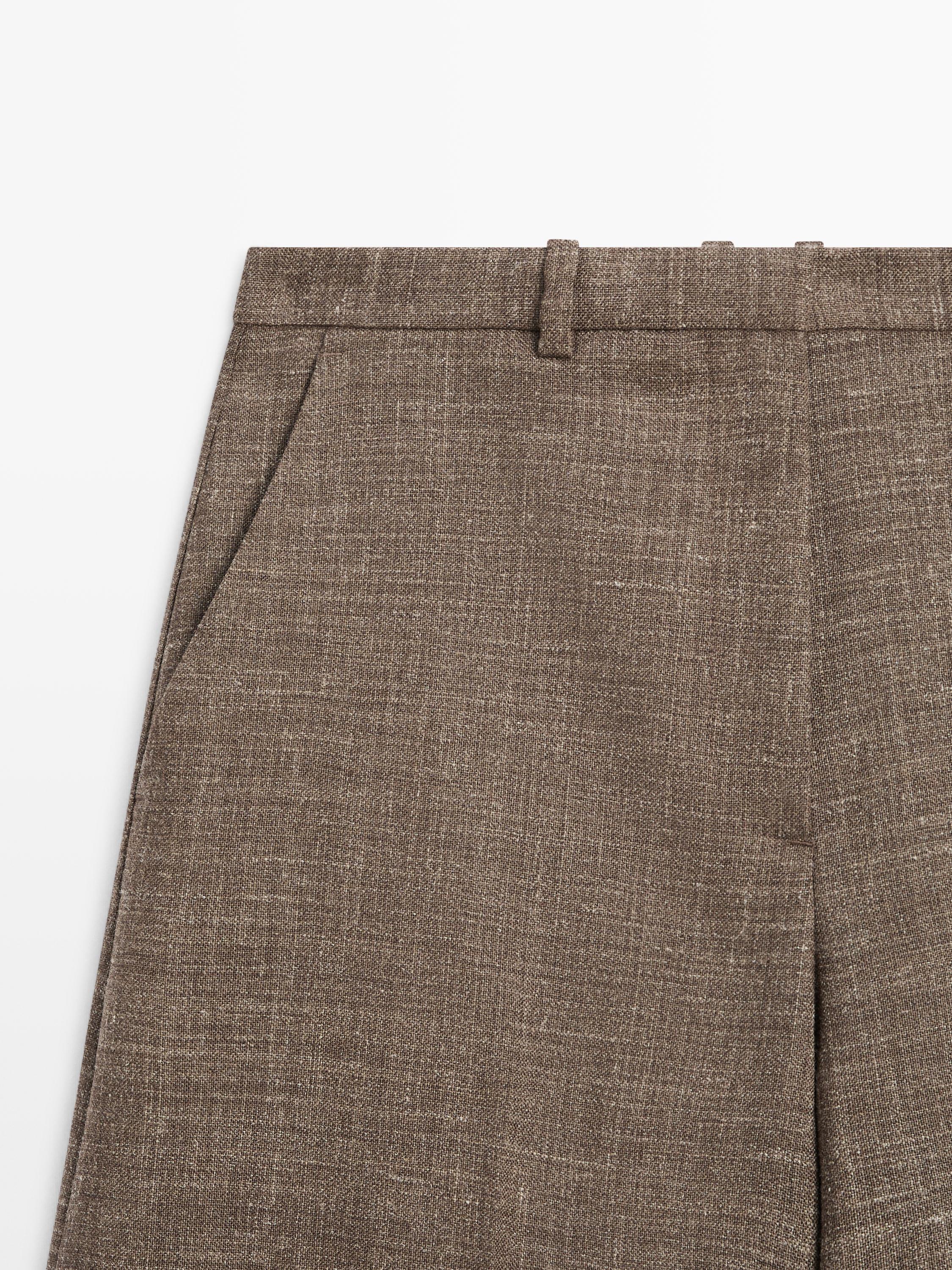 Wide-leg voluminous wool blend trousers