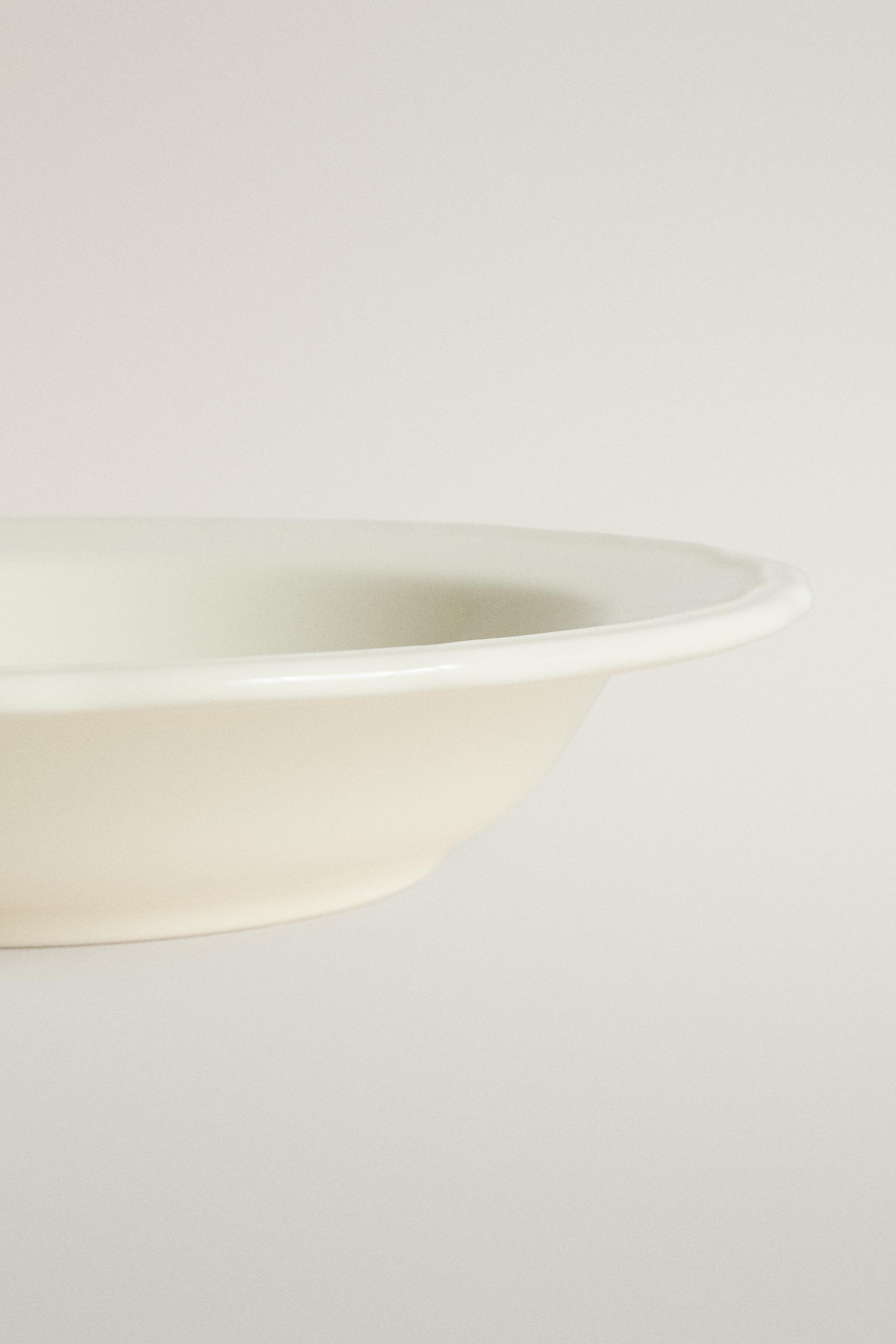 EARTHENWARE SOUP PLATE WITH RAISED-DESIGN EDGE