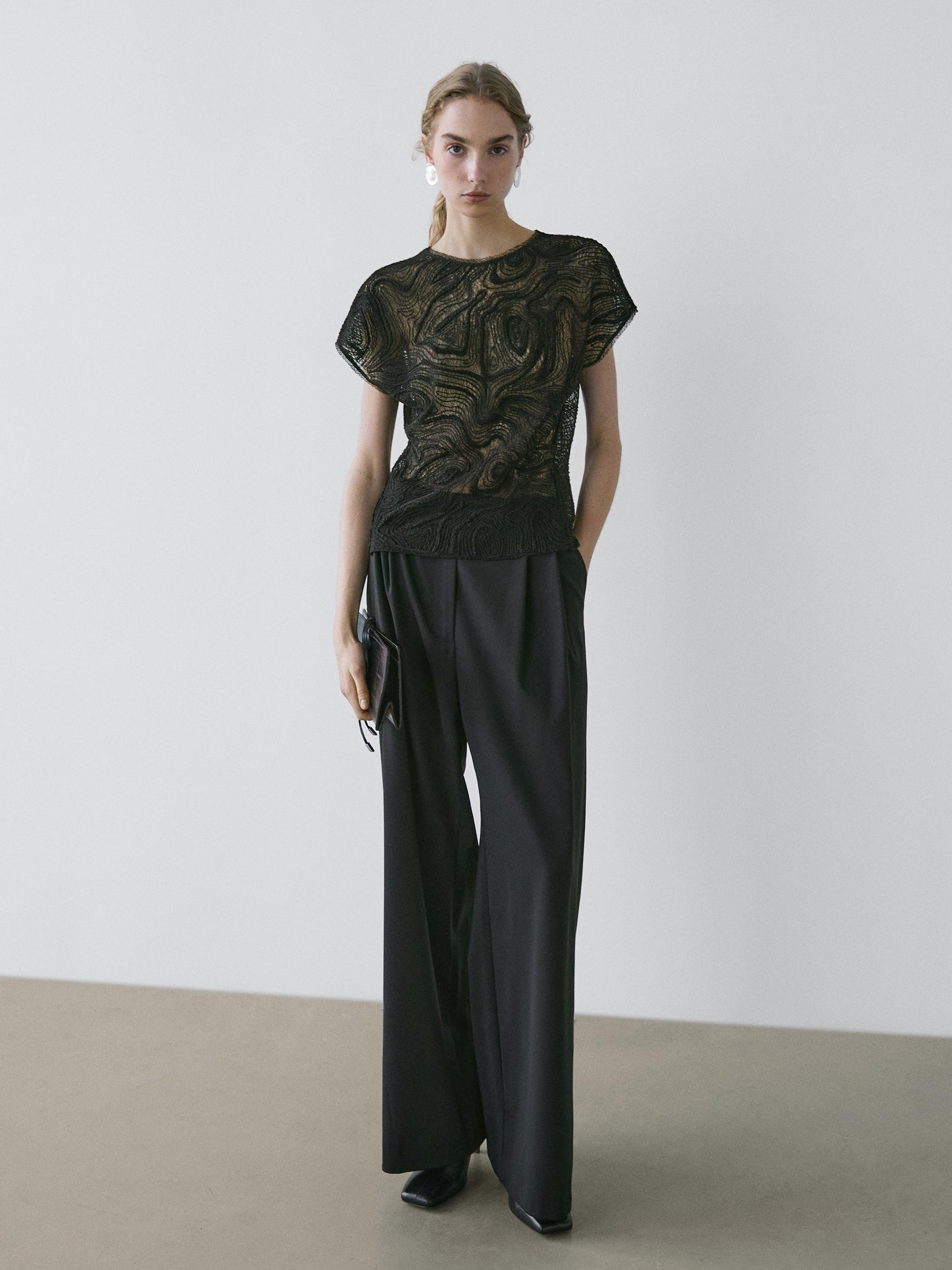 Semi-sheer embroidered top