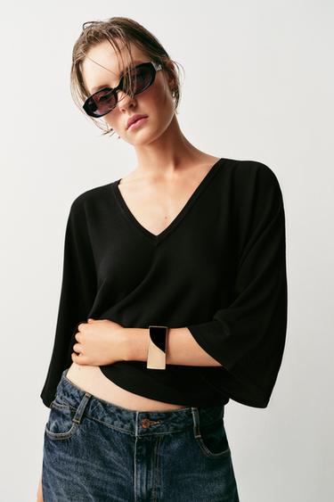 JERSEY PUNTO FLUIDO ESCOTE PICO - Negro de Zara