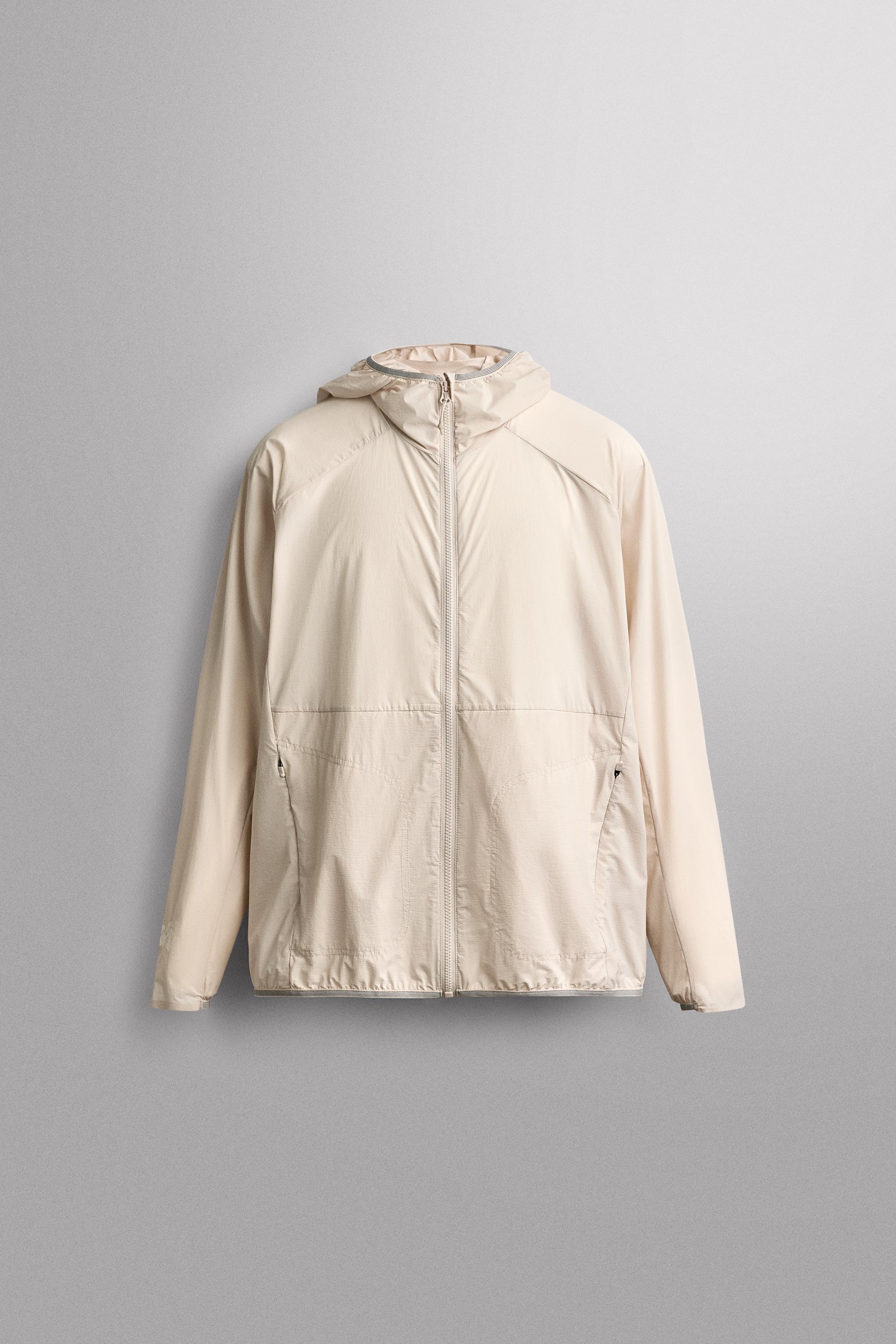 TECHNICAL WINDBREAKER JACKET
