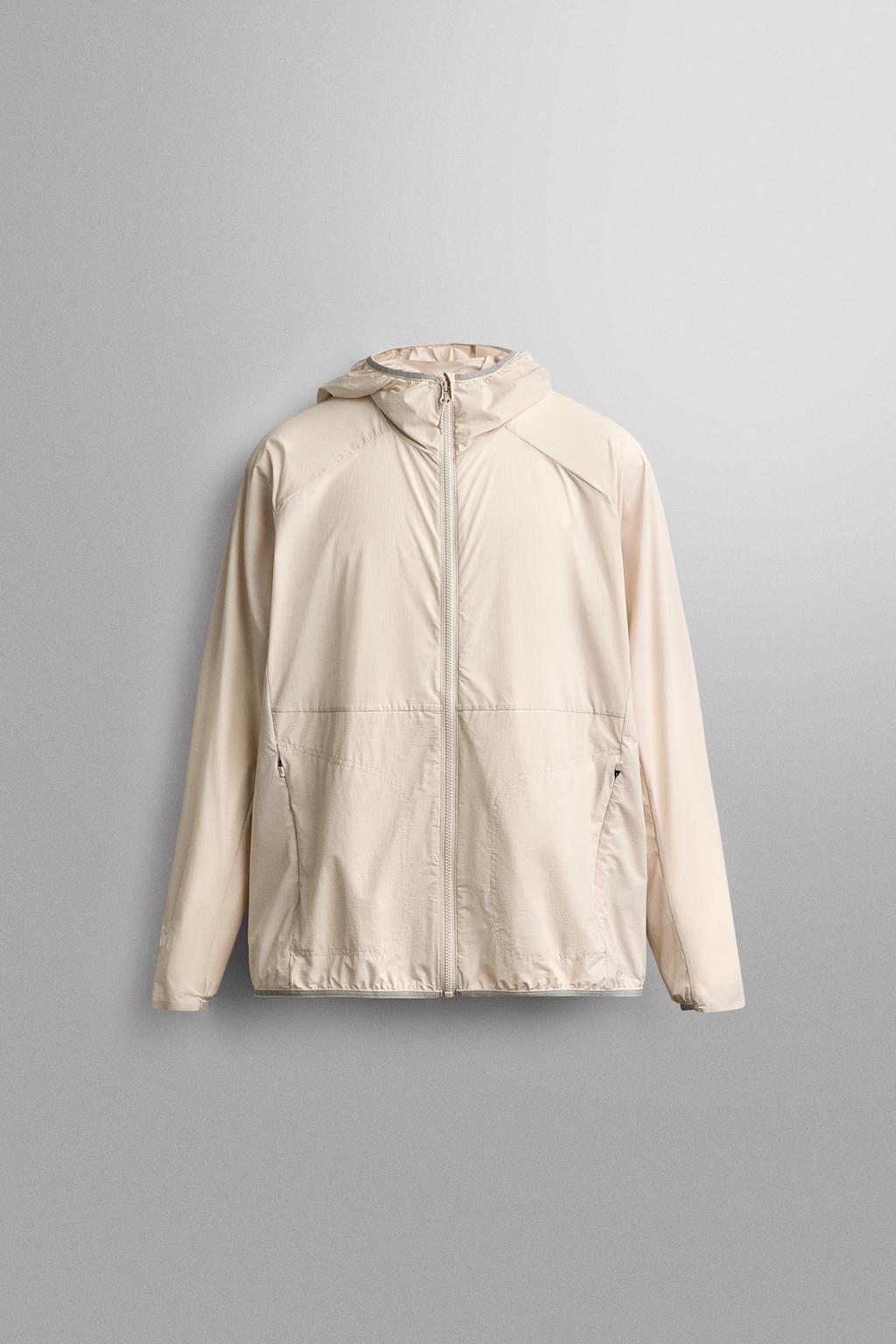 TECHNICAL WINDBREAKER JACKET