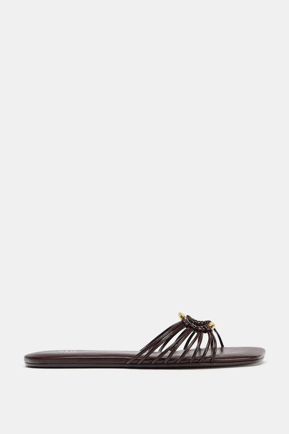 FLAT SANDALS WITH METALLIC TRIM